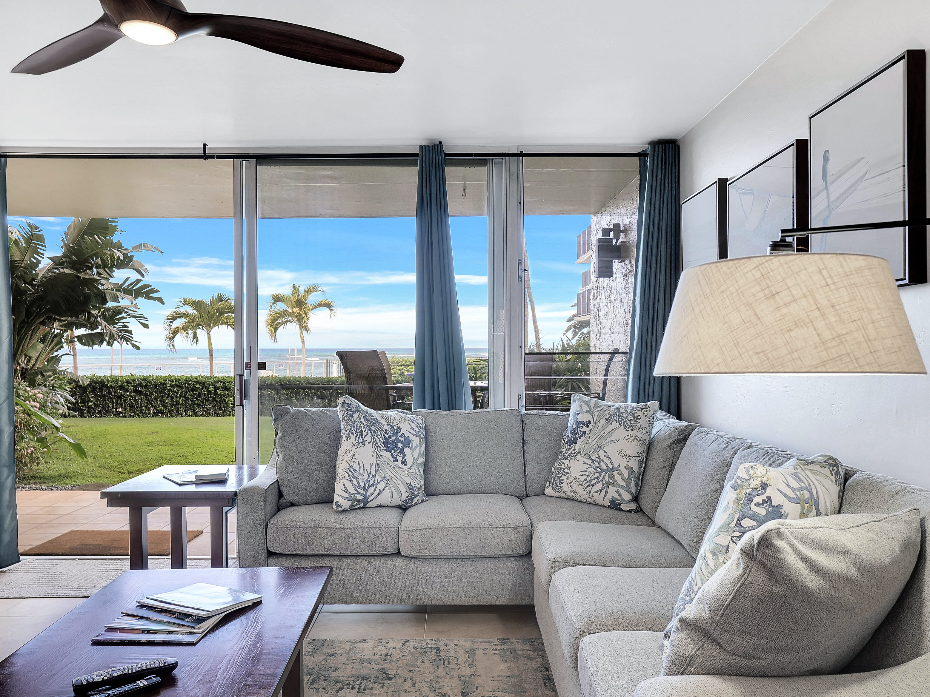 Ocean-view living room at Hololani Unit B102