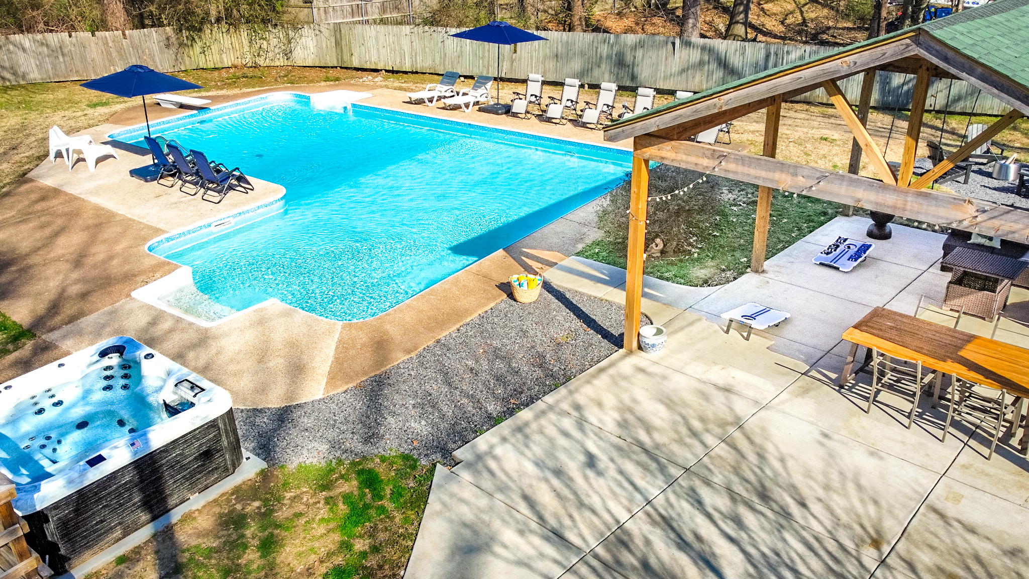 Poolside paradise! Enjoy our salt cell pool and hot tub for the ultimate relaxation.