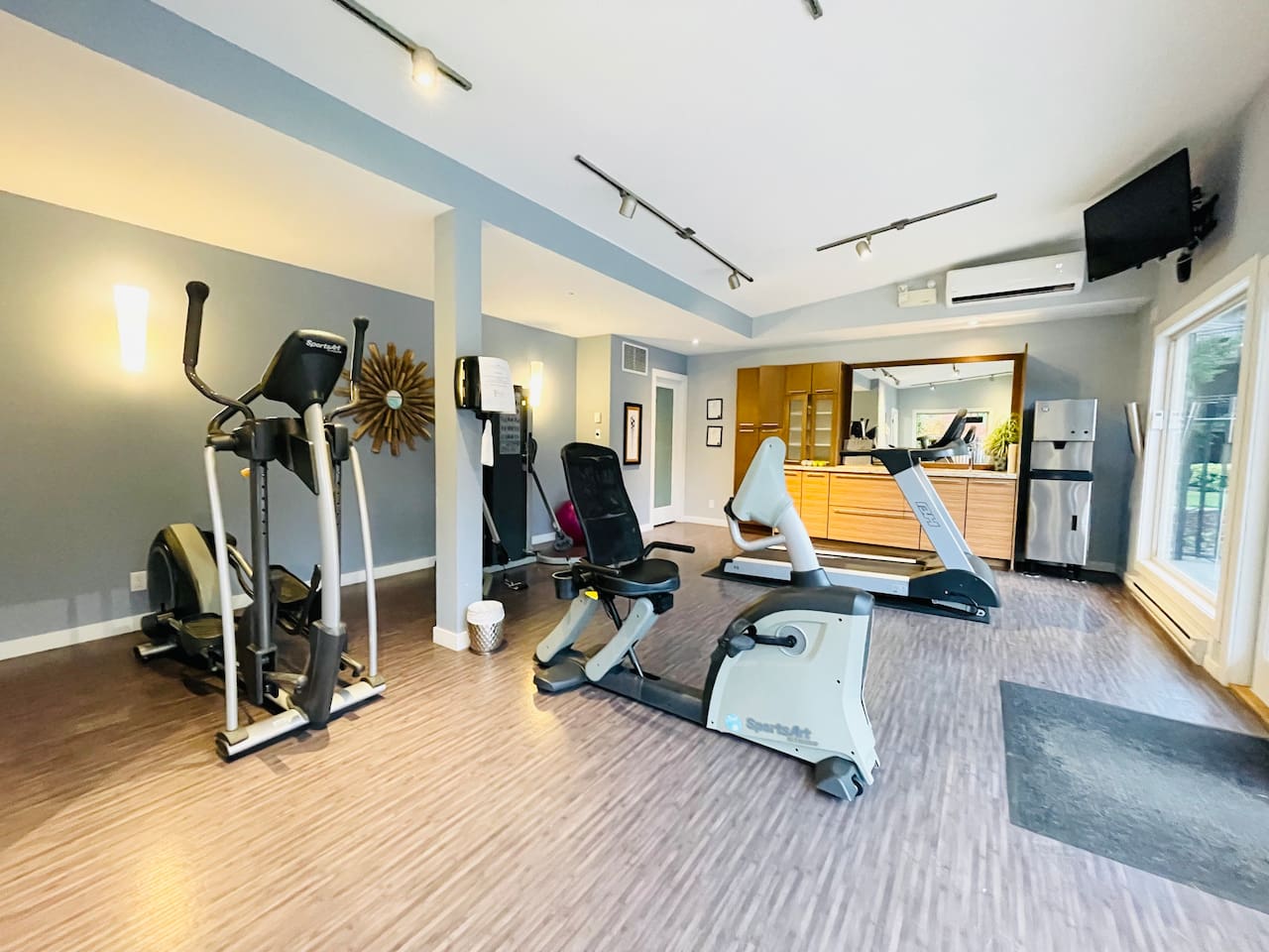 View of Inside the Gym Facilities - Bicycle, Treadmill, Elliptical and Cable Machine up to 65 lbs.