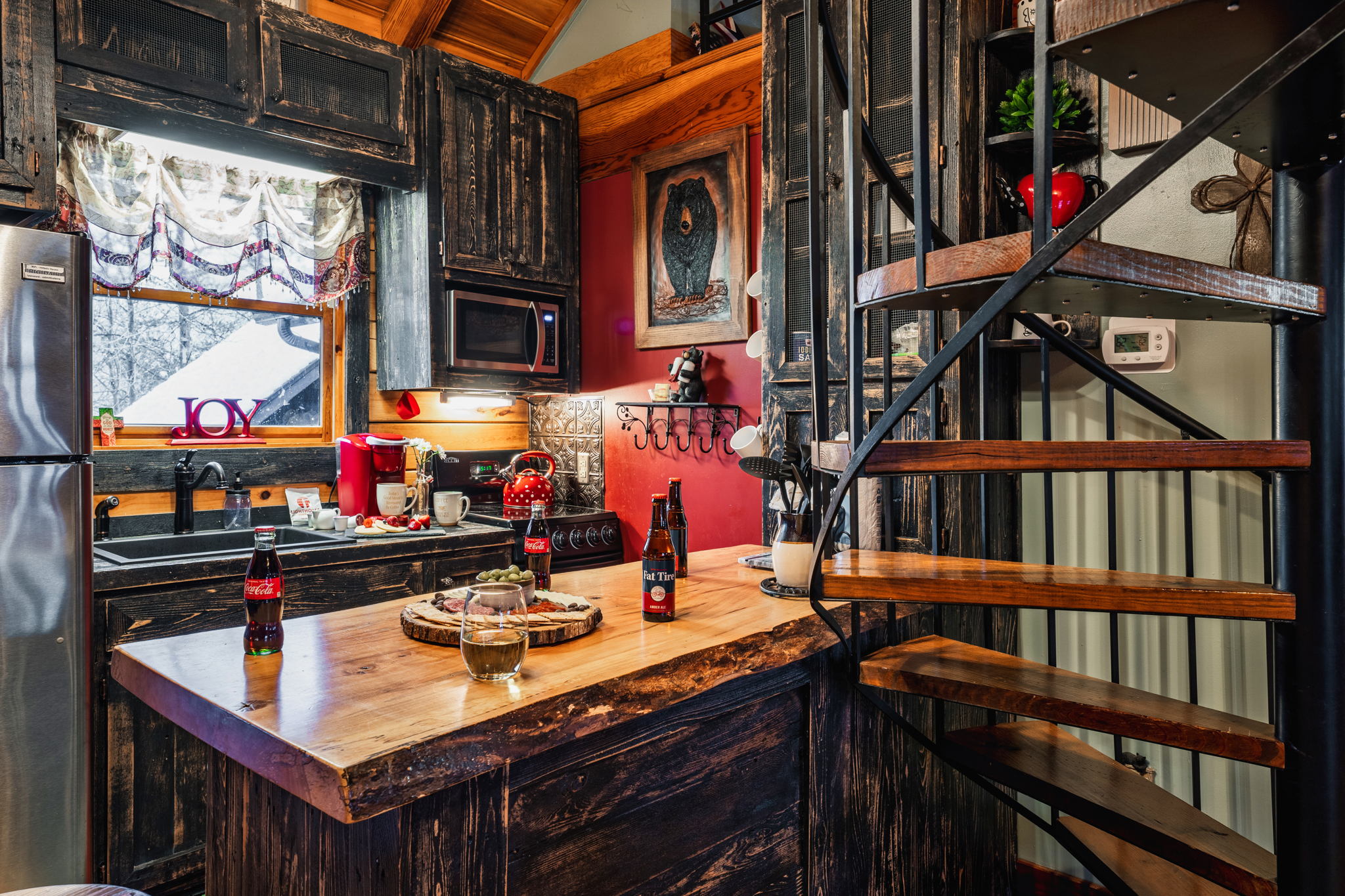 The cutest dinkiest kitchen that is fully stocked for your cooking pleasures