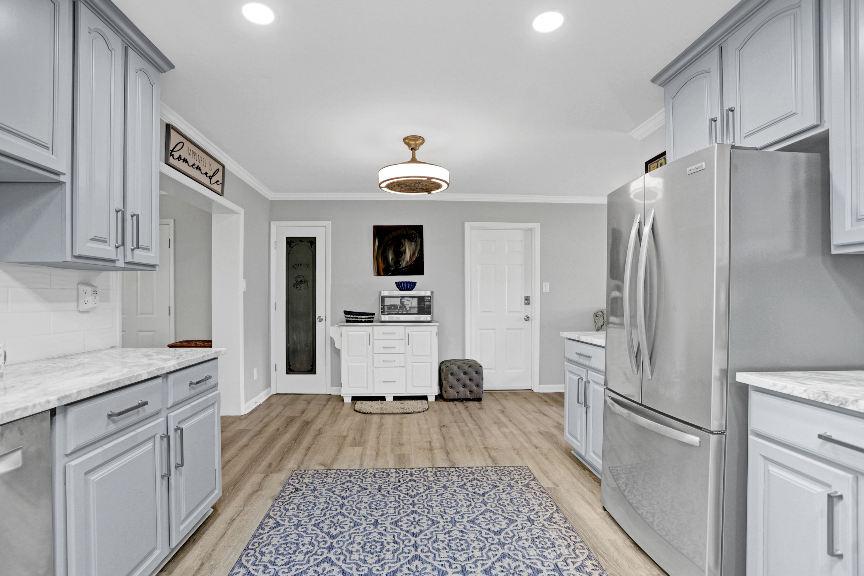 Enjoy the airy, open layout—this kitchen flows effortlessly into the living and dining areas, keeping everyone connected.