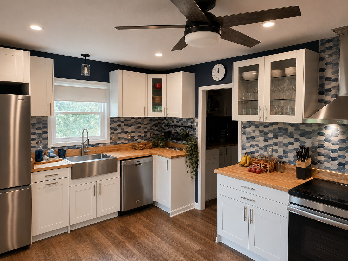 Fully equipped kitchen with generous counter space, stainless appliances and easy access to the dining area.