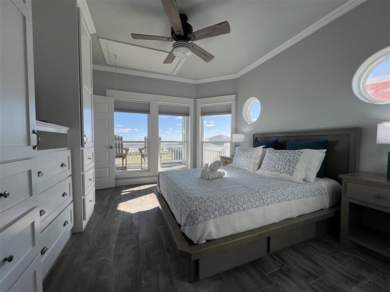 Crystal Paradise Bedroom 3: Refined second-floor queen bedroom with ensuite bath, ideal for two guests.