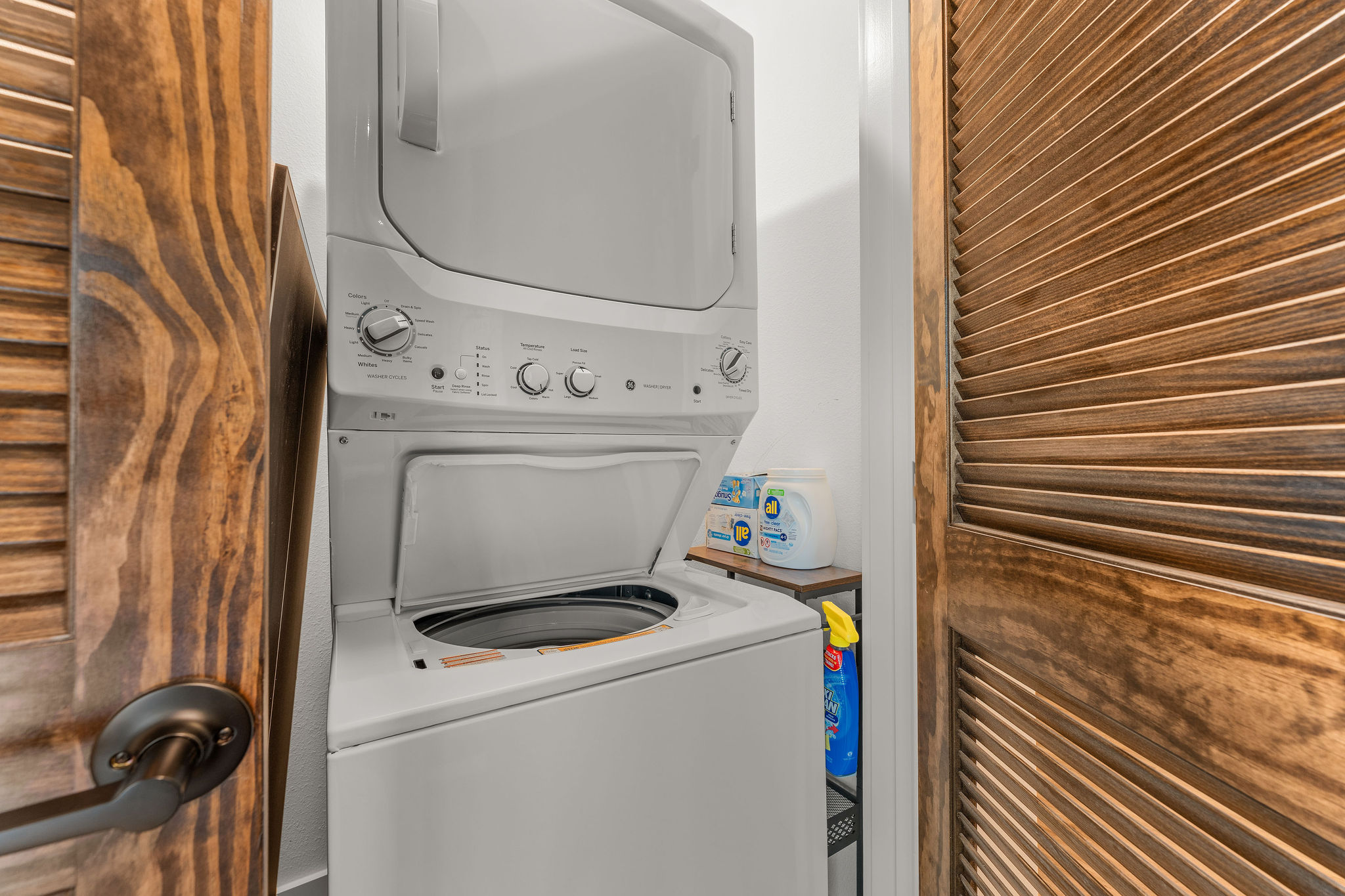 The lower level also sports its own washer and dryer. How convenient is that!!