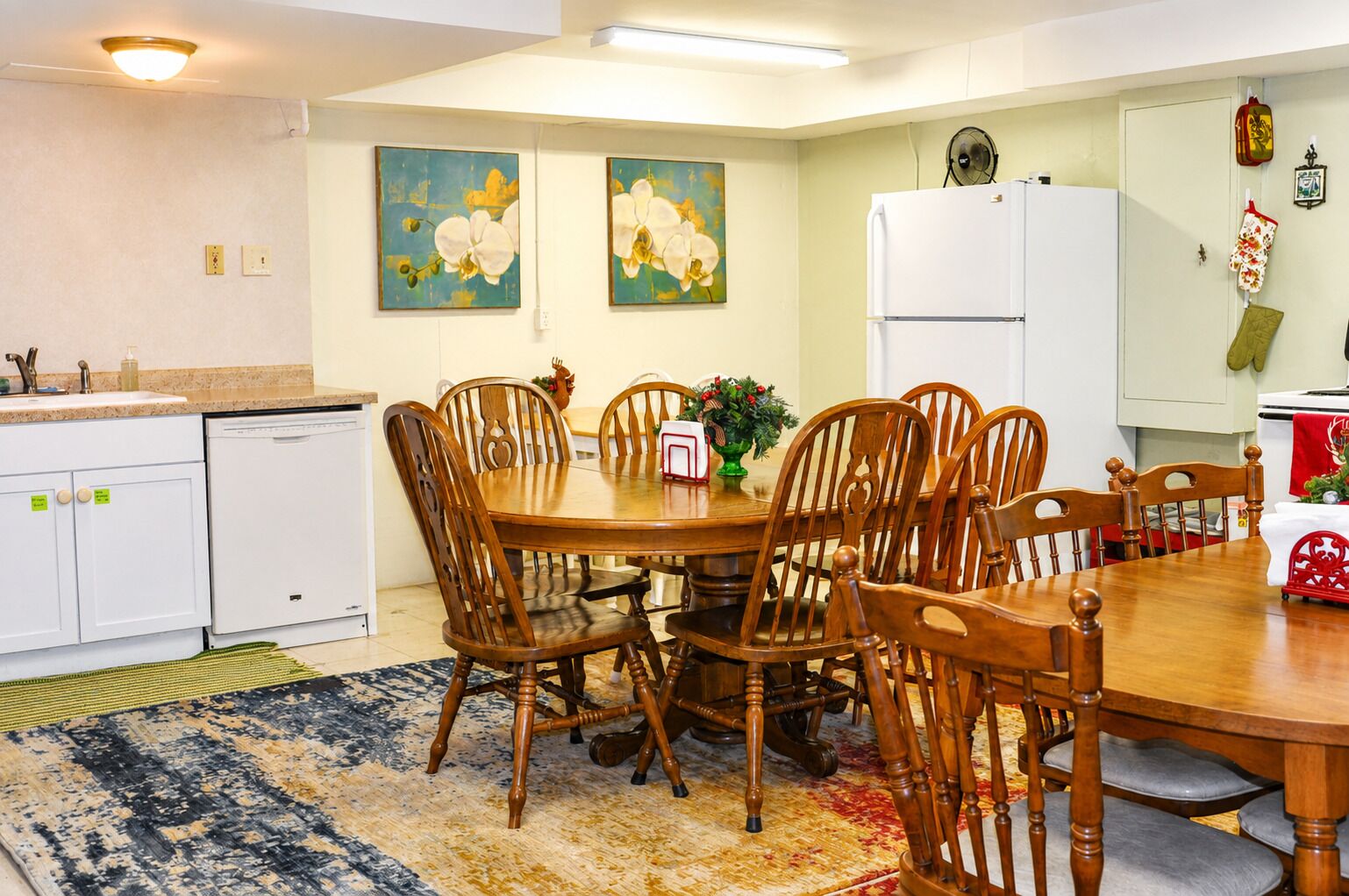 This lower-level kitchen may remind you of a classic church supper or community gathering space — warm, functional, and ready for family meals.