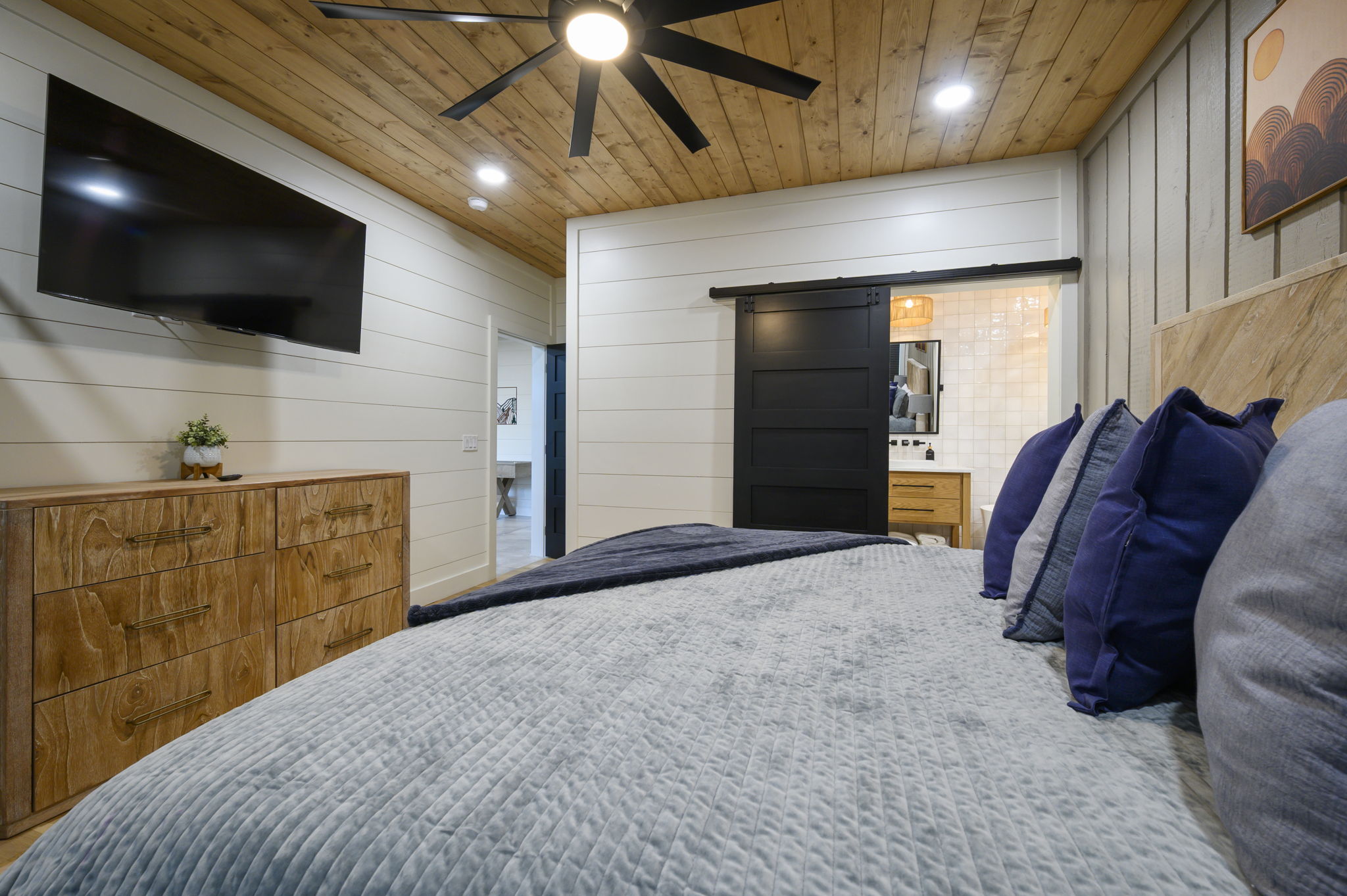 Rest easy in a spacious king bedroom with inviting, high-end details.