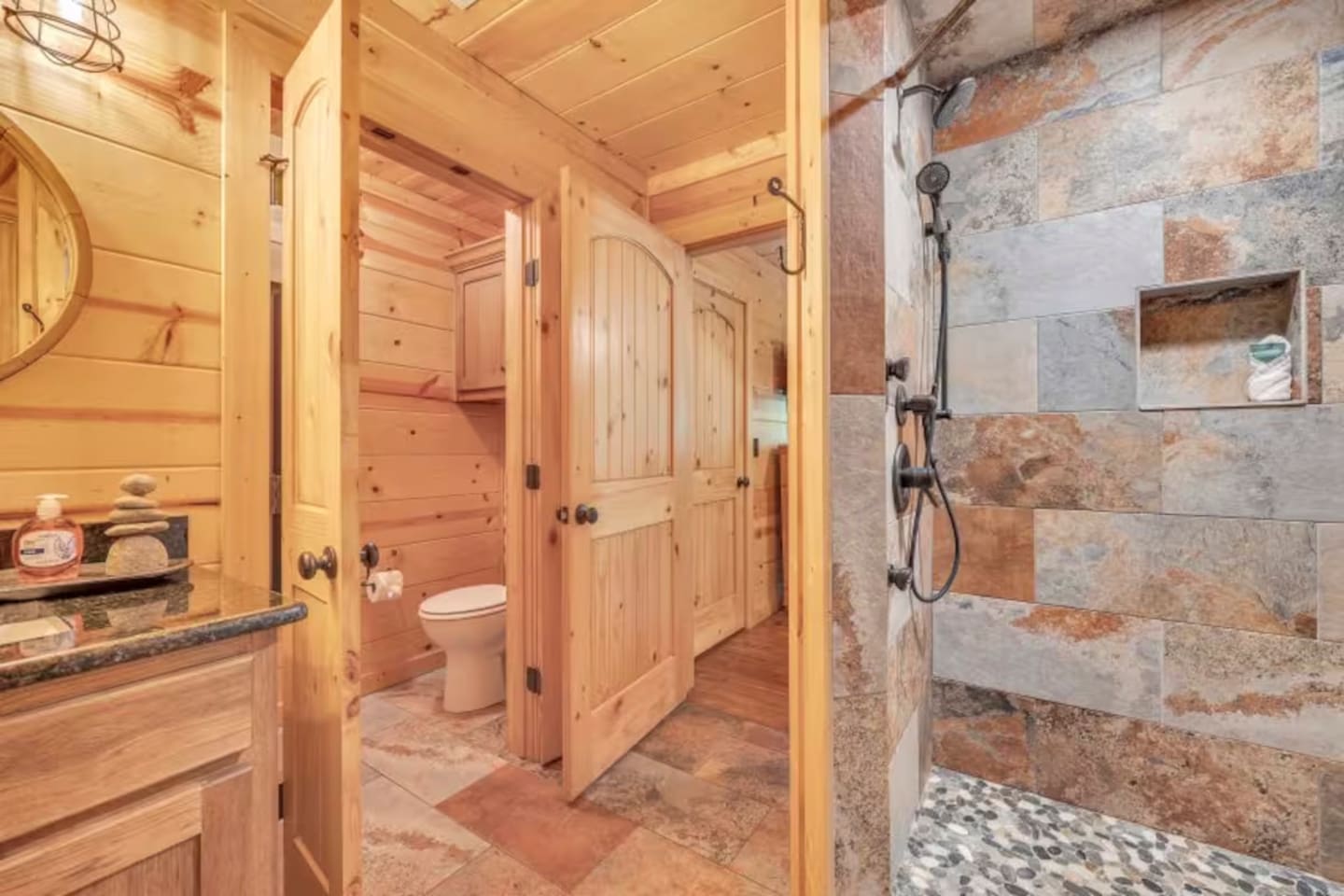 Unwind in this serene space, complete with a walk-in shower and bath essentials to keep you feeling fresh.