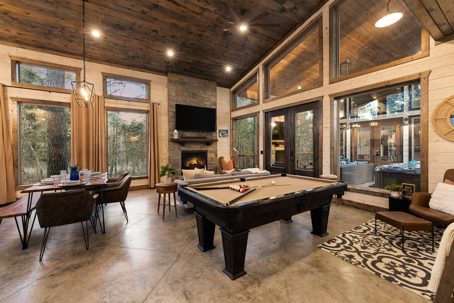 A cheerful game bunkhouse designed for connection and play, complete with a pool table and room to relax.