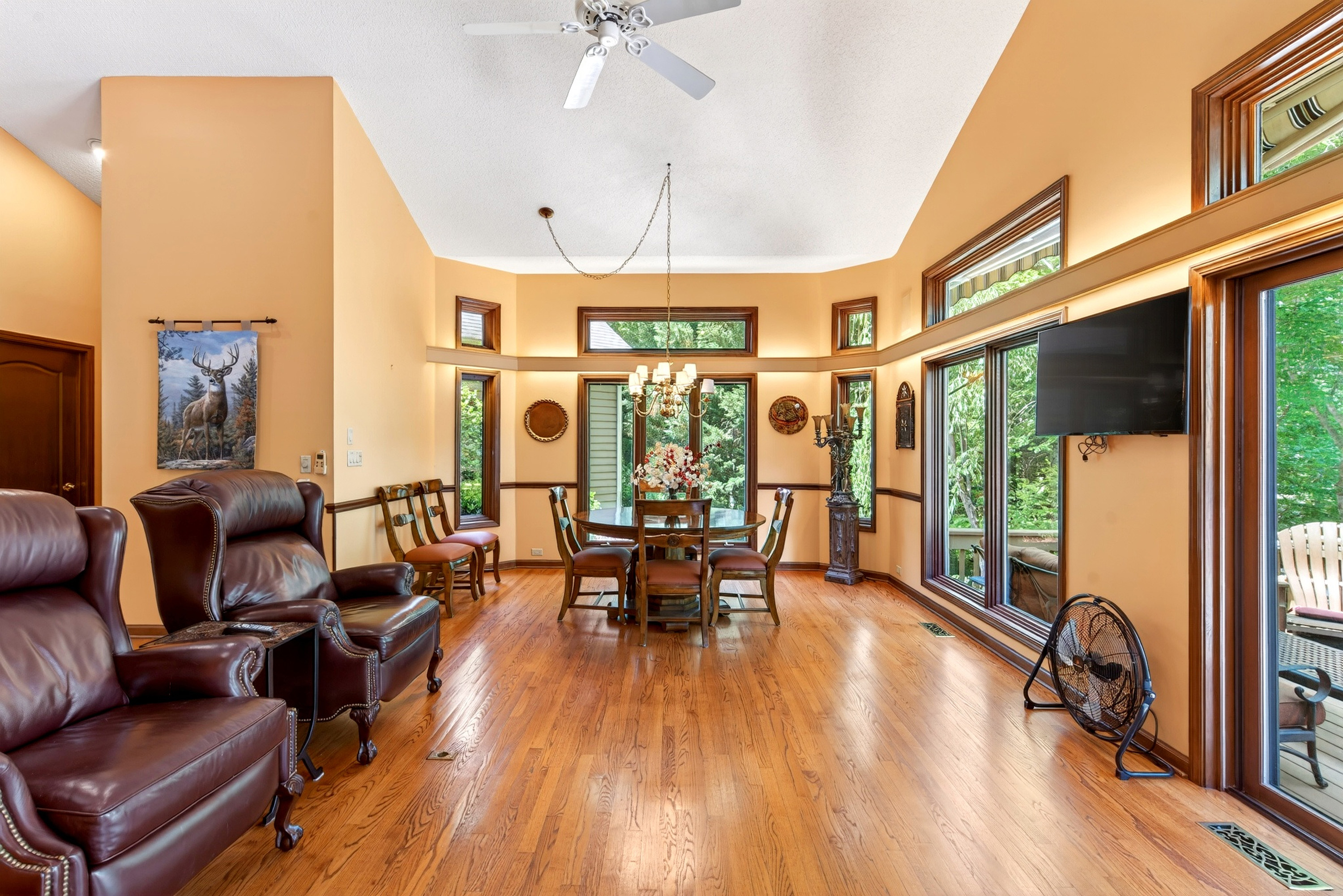 Comfortable seating for two, to watch TV across from the kitchen