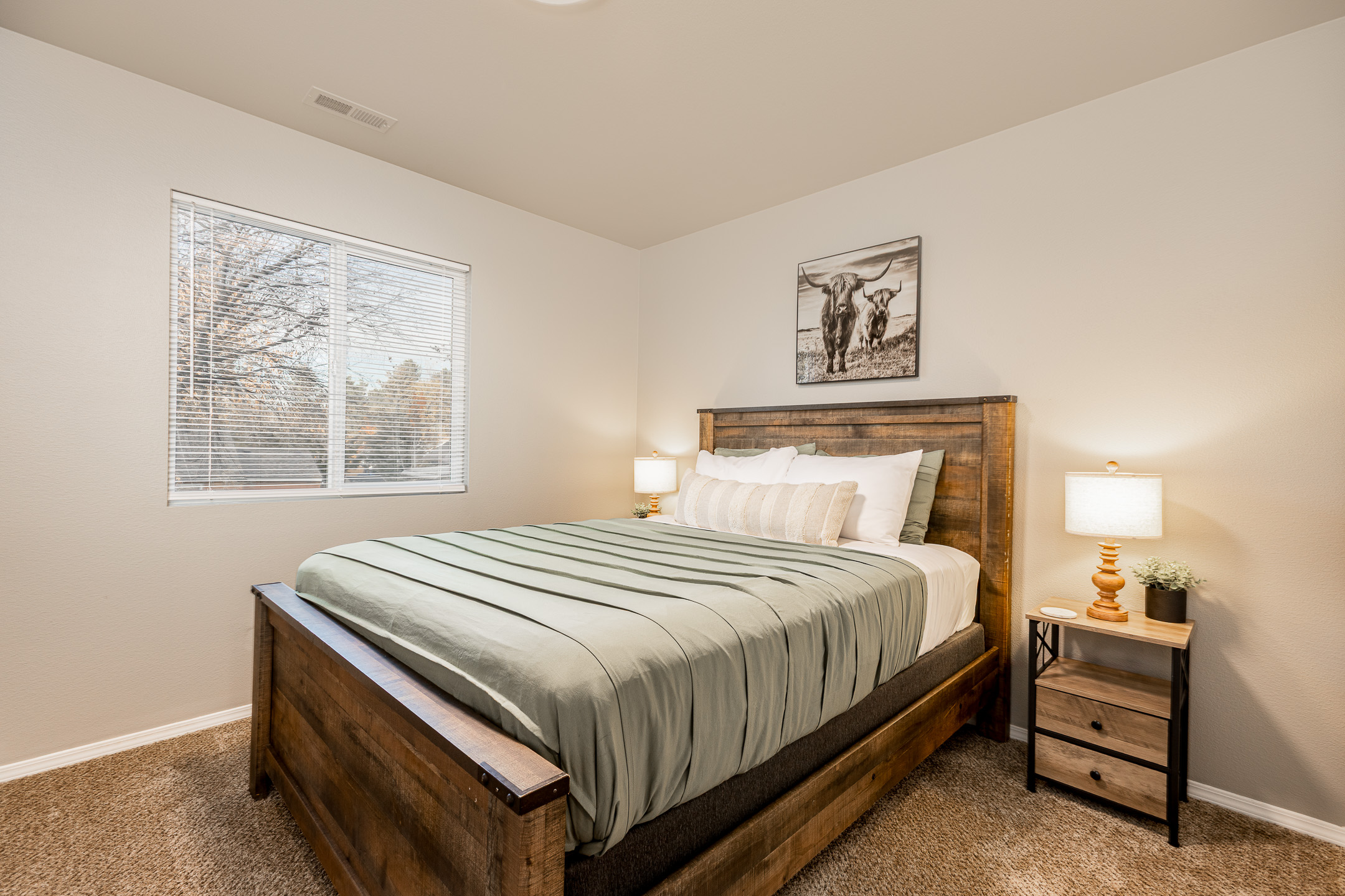 3006 Regan – Bedroom Two
Warm and inviting space for a restful night.