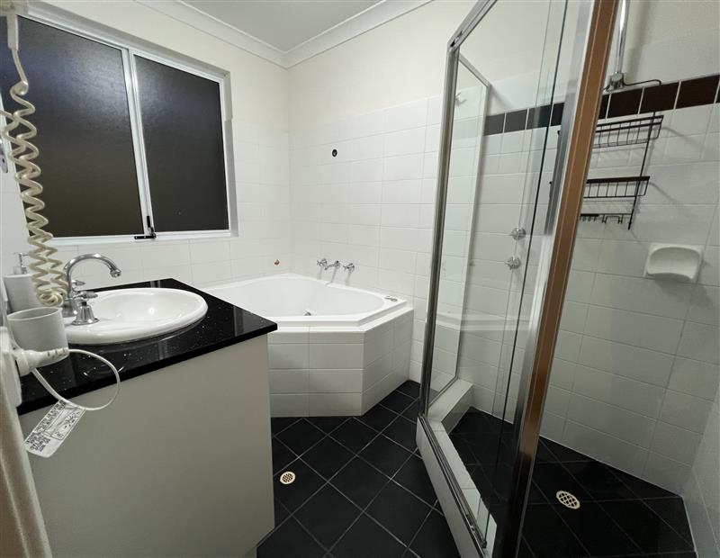 Main Bathroom with shower & spa bath