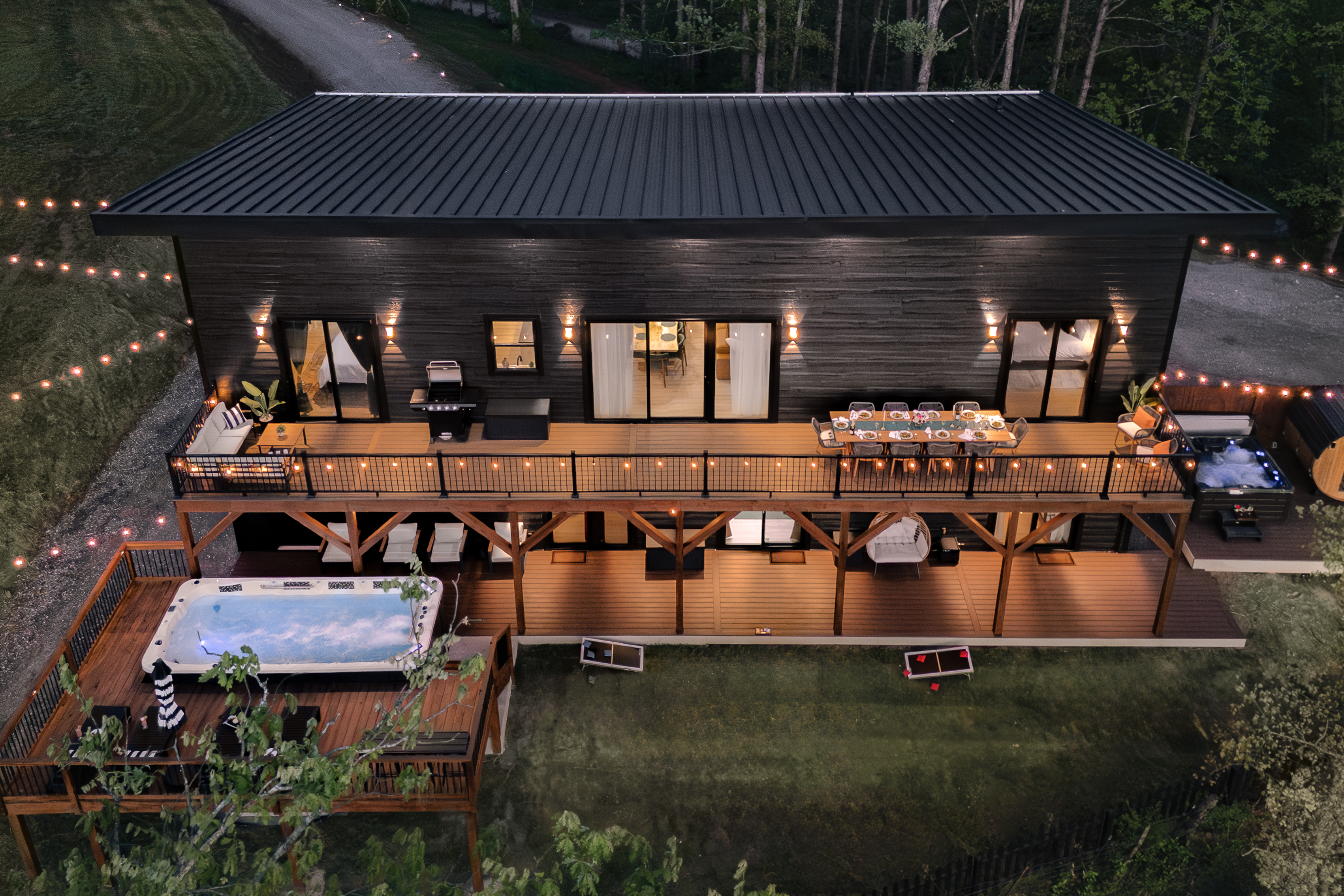 {Summit Exterior} Set on 2 private acres bordering open farmland, the home offers rare privacy, wide-open views, and the occasional visit from cows along the fence line.
