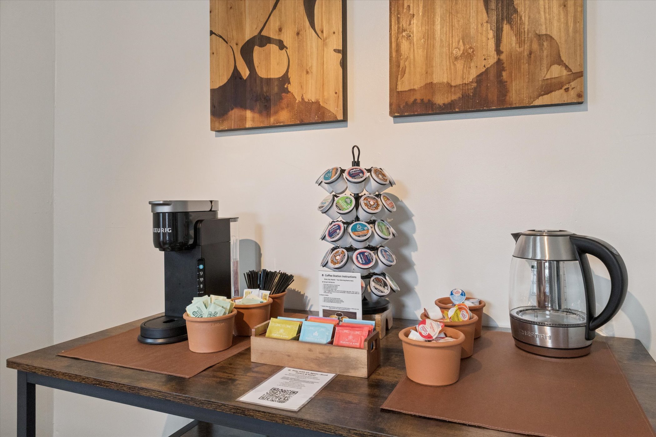 Morning moments at Varsity Alfresco—our industrial-chic nook features a high-top table, bike-pedal stools, and a stocked coffee station. Comfort and connection near Notre Dame.