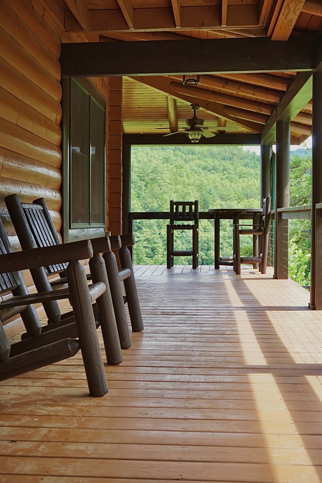 Porch Paradise: Sip morning coffee surrounded by breathtaking mountain views!