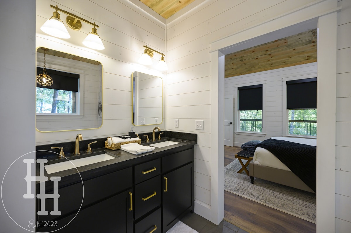 Master bathroom with barn door entry into the master bedroom