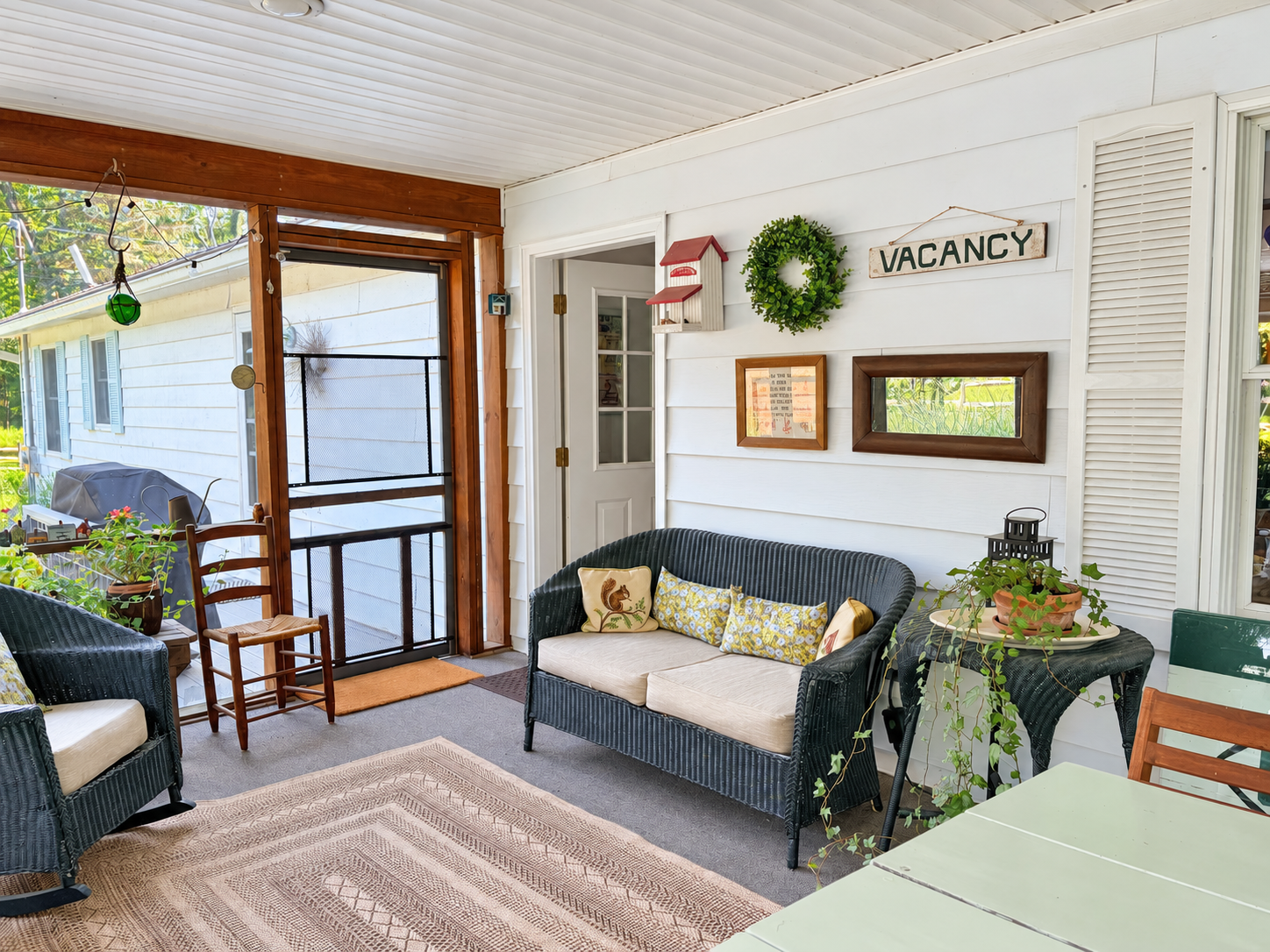 Screened porch seating.