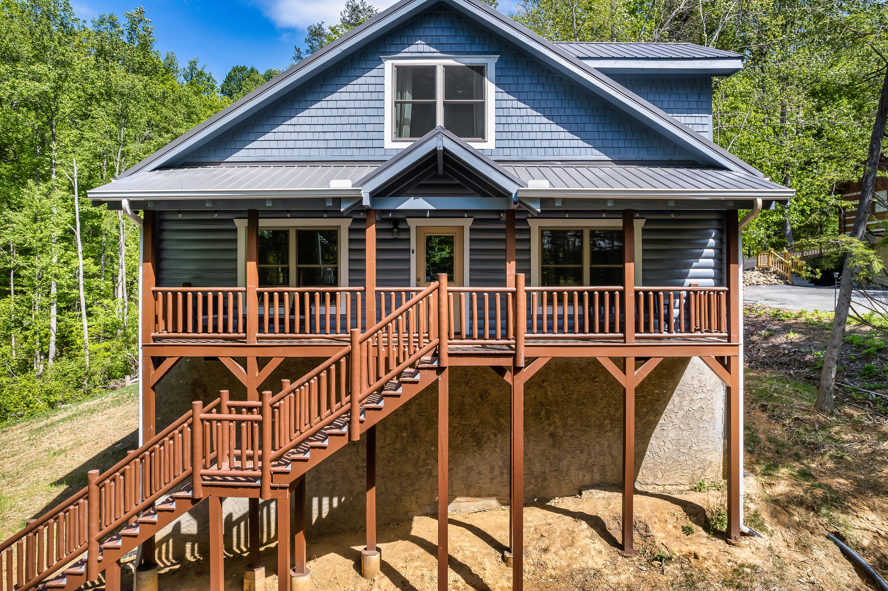 A front view of the cabin. That porch is just asking for you to hang out on it.