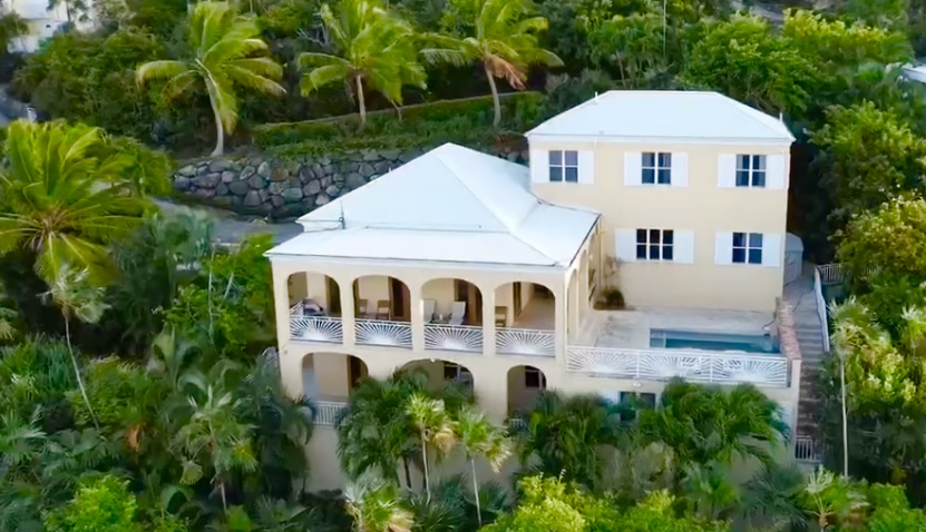 Aerial view of the villa surrounded by lush tropical landscape—private, peaceful, and ocean-facing.