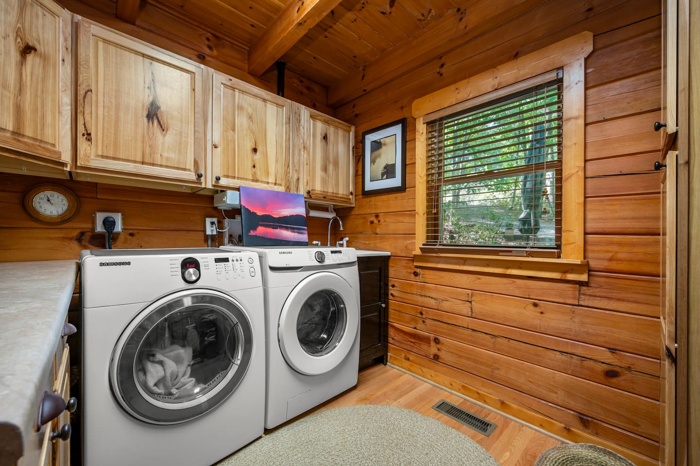 Convenient laundry room with full-size water and dryer, making extended stays easy and comfortable.