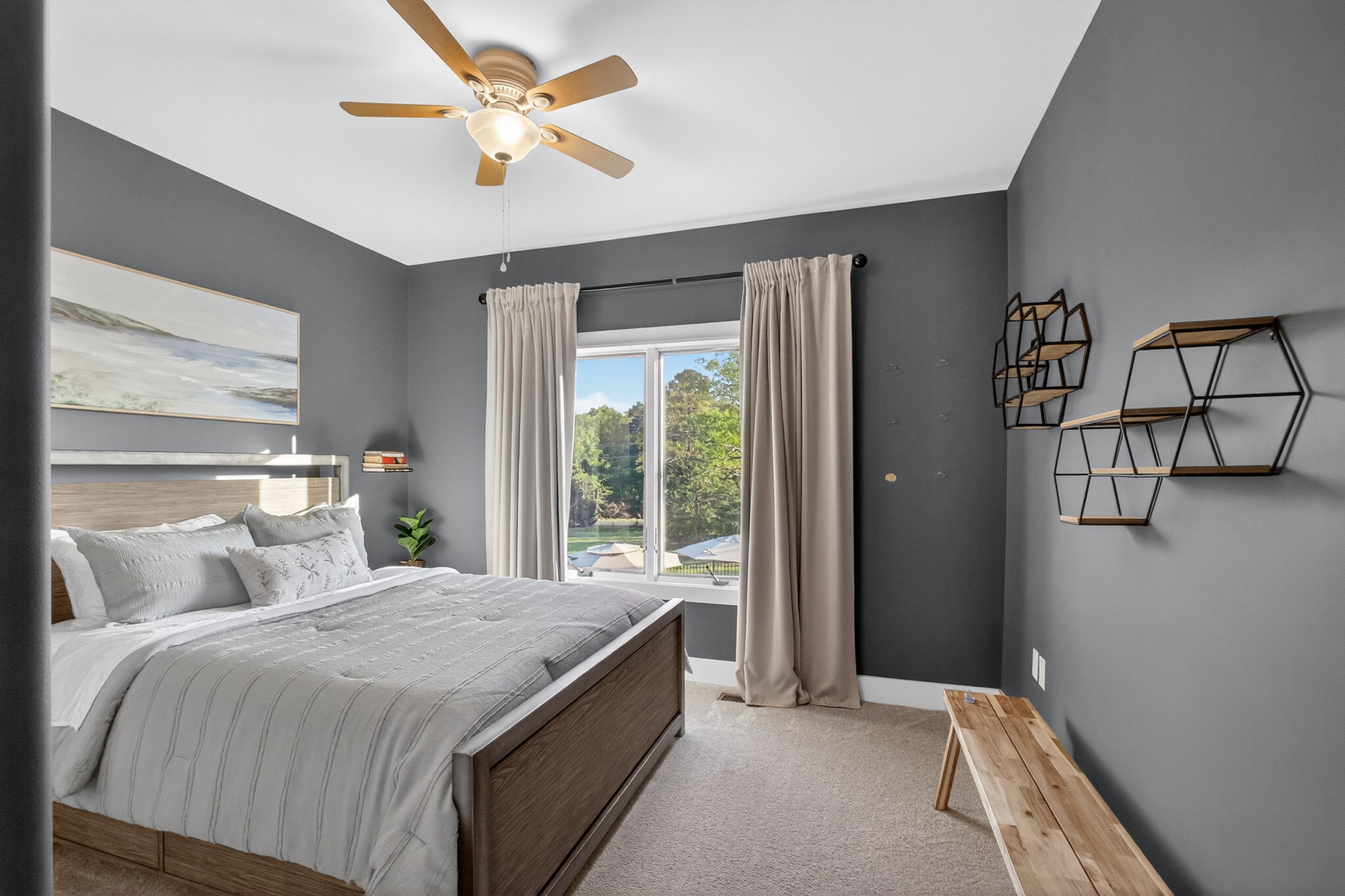 Comfortable guest bedroom with natural light
