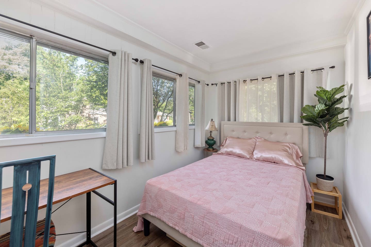 Full sized bed in second bedroom. Desk space for working from home. 

Note this bedroom is accessed both from the outside as well as through first bedroom. 