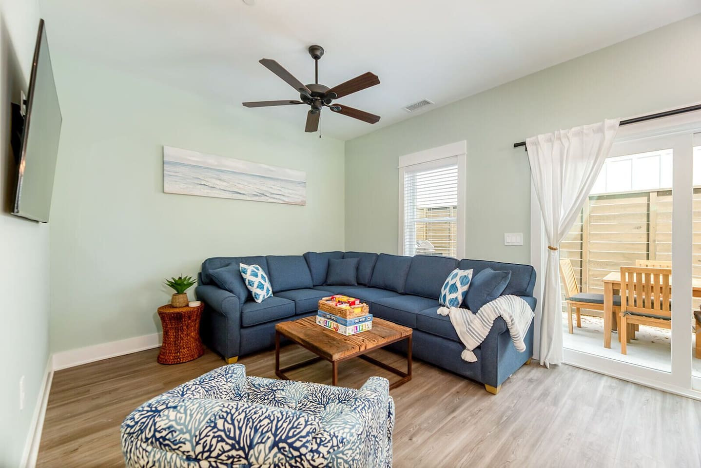 Relax after beach days in the inviting living area featuring plush seating, entertainment, and additional sleeping space.