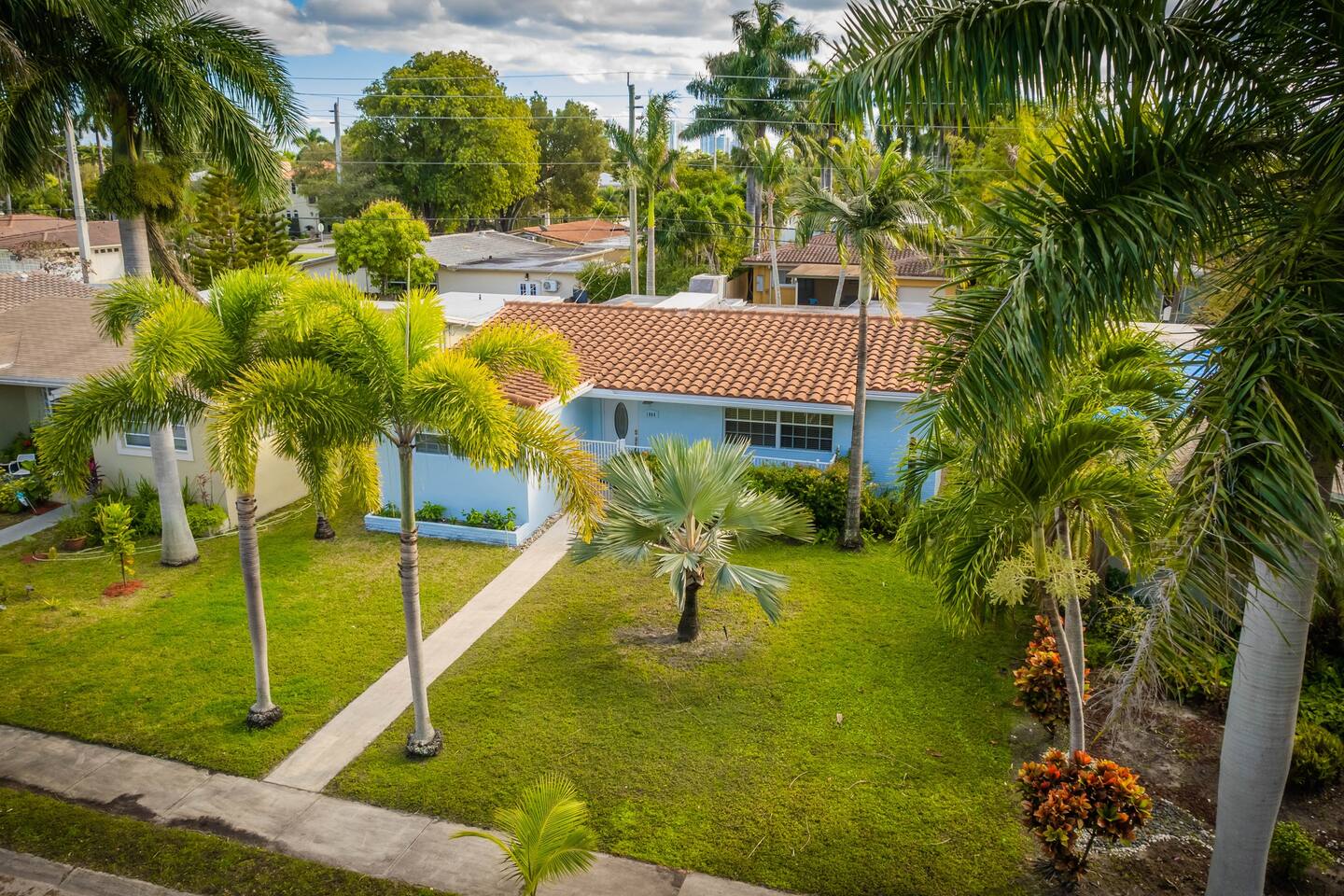 Just a 5 minute walk to Hollywood Beach Boardwalk is this lovely Bungalow tucked in a safe family-friendly neighborhood