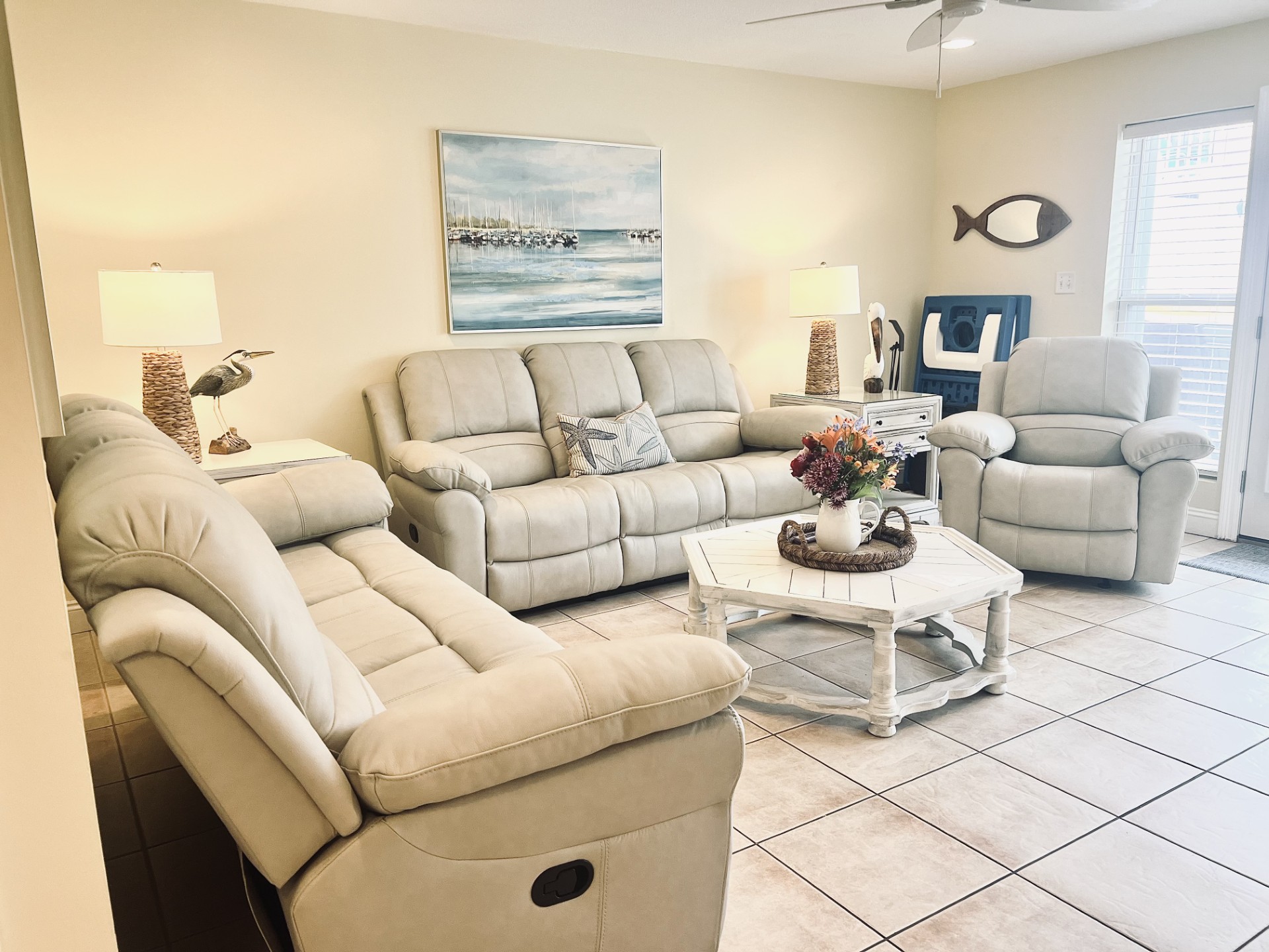 New Living Room furniture with 2 leather sofa's that both have 2 built in recliners. Plus, large recliner!