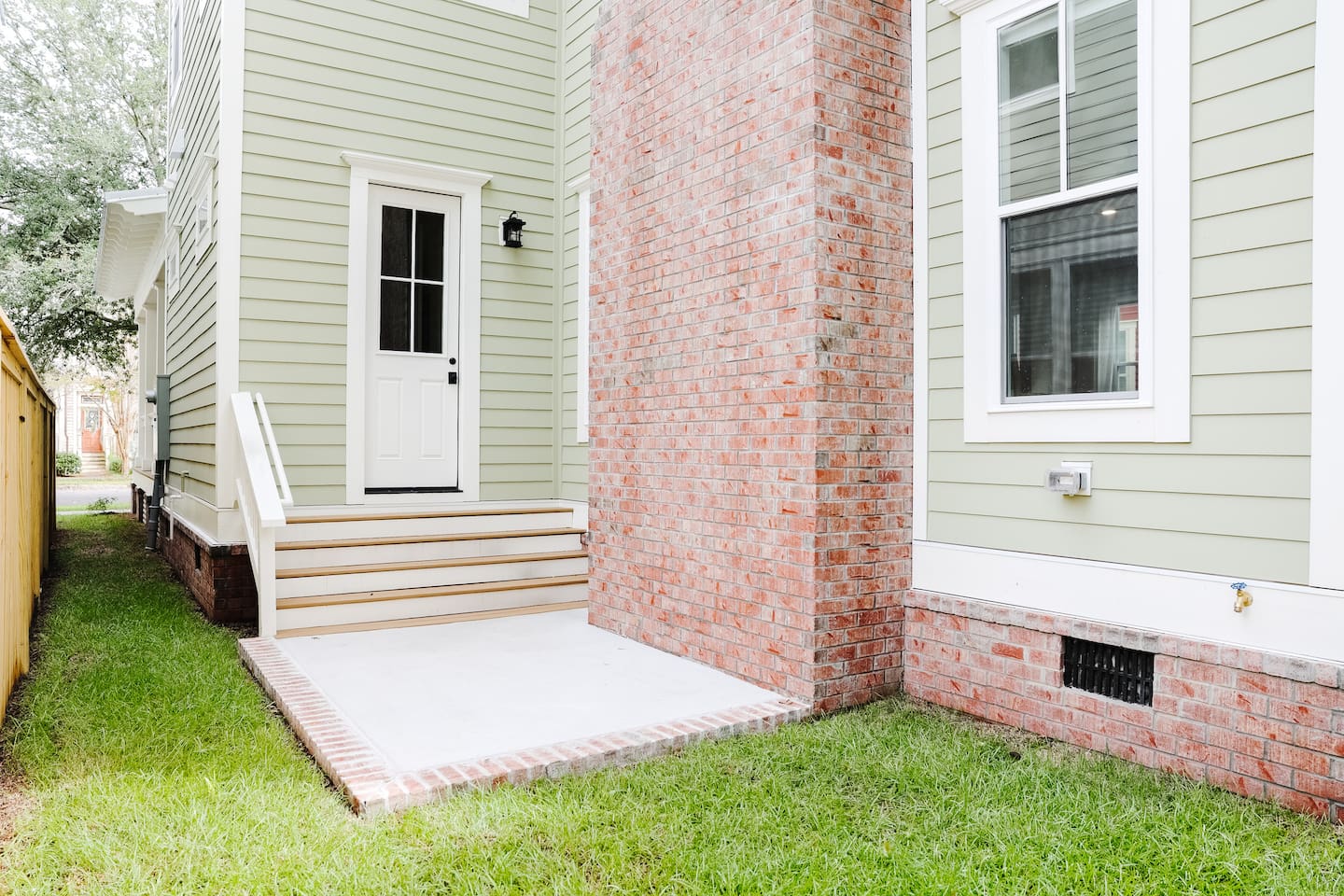 Outdoor patio is a great place to enjoy the coastal weather with friends. **will feature bistro table and market lights**