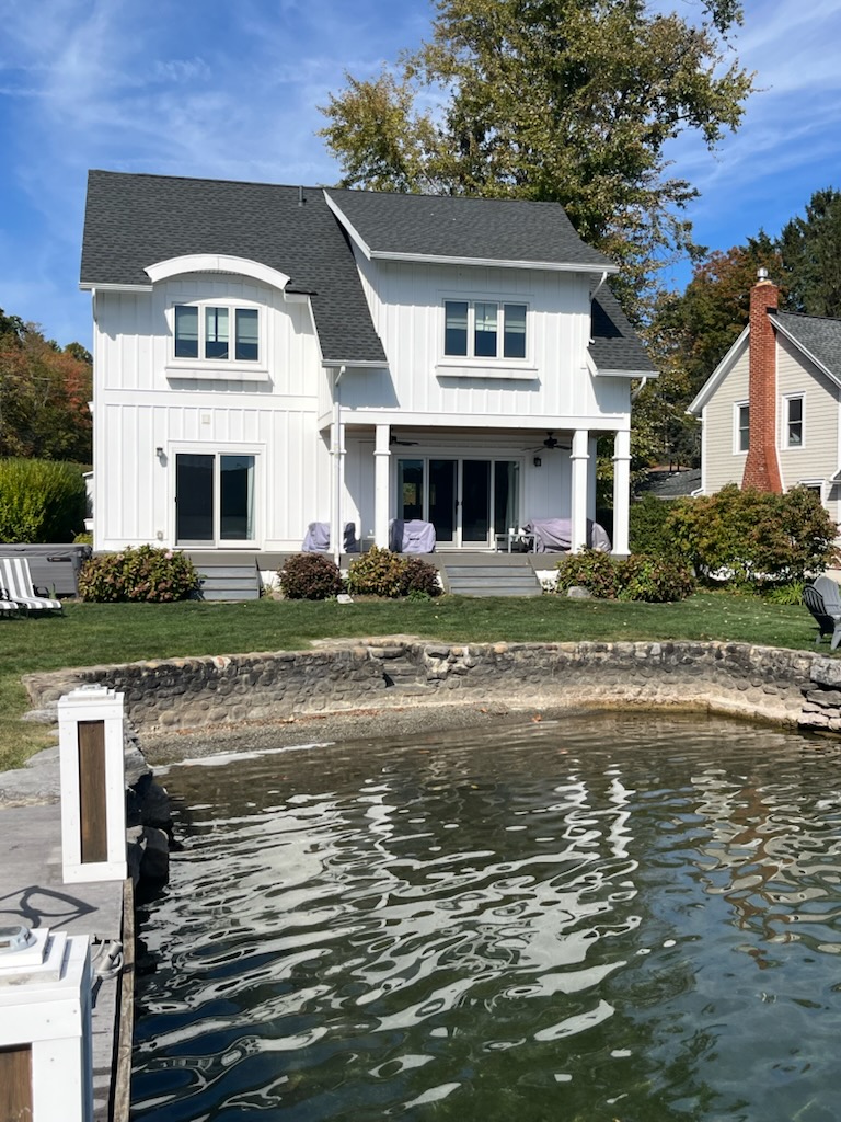 View of house while standing on the dock