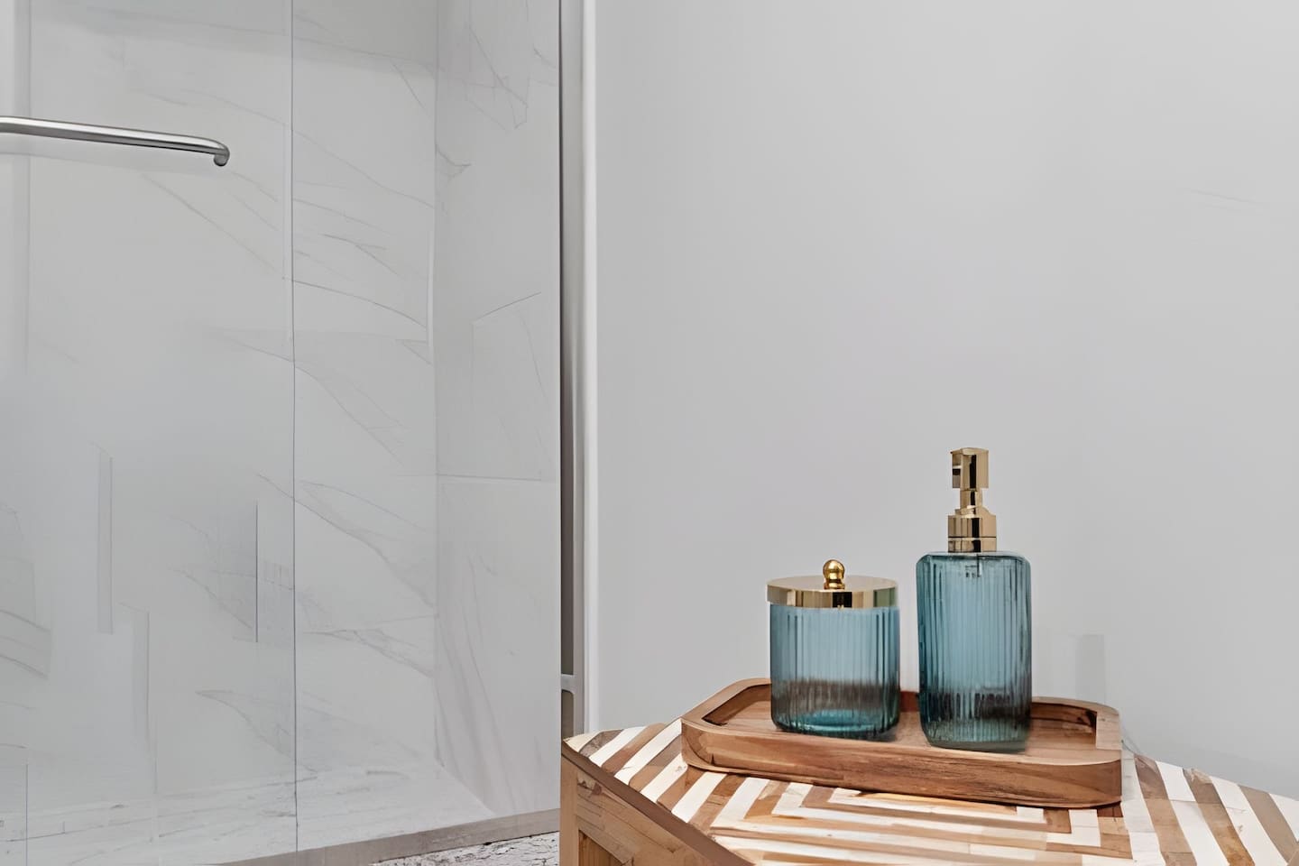 A sleek, modern bathroom featuring high-end finishes.