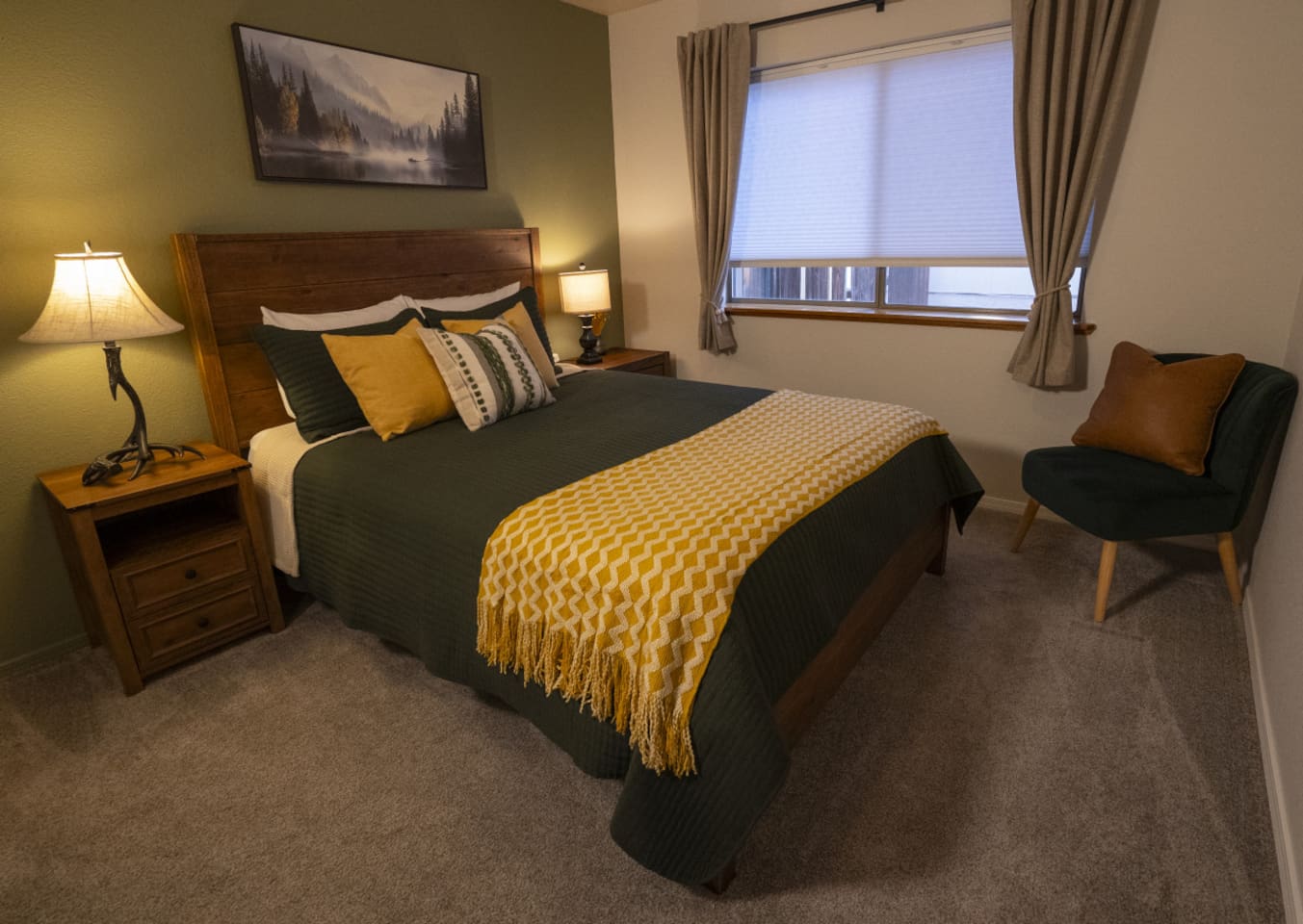 Bedroom features a queen bed, closet space, and a cozy setup for a good night’s sleep.