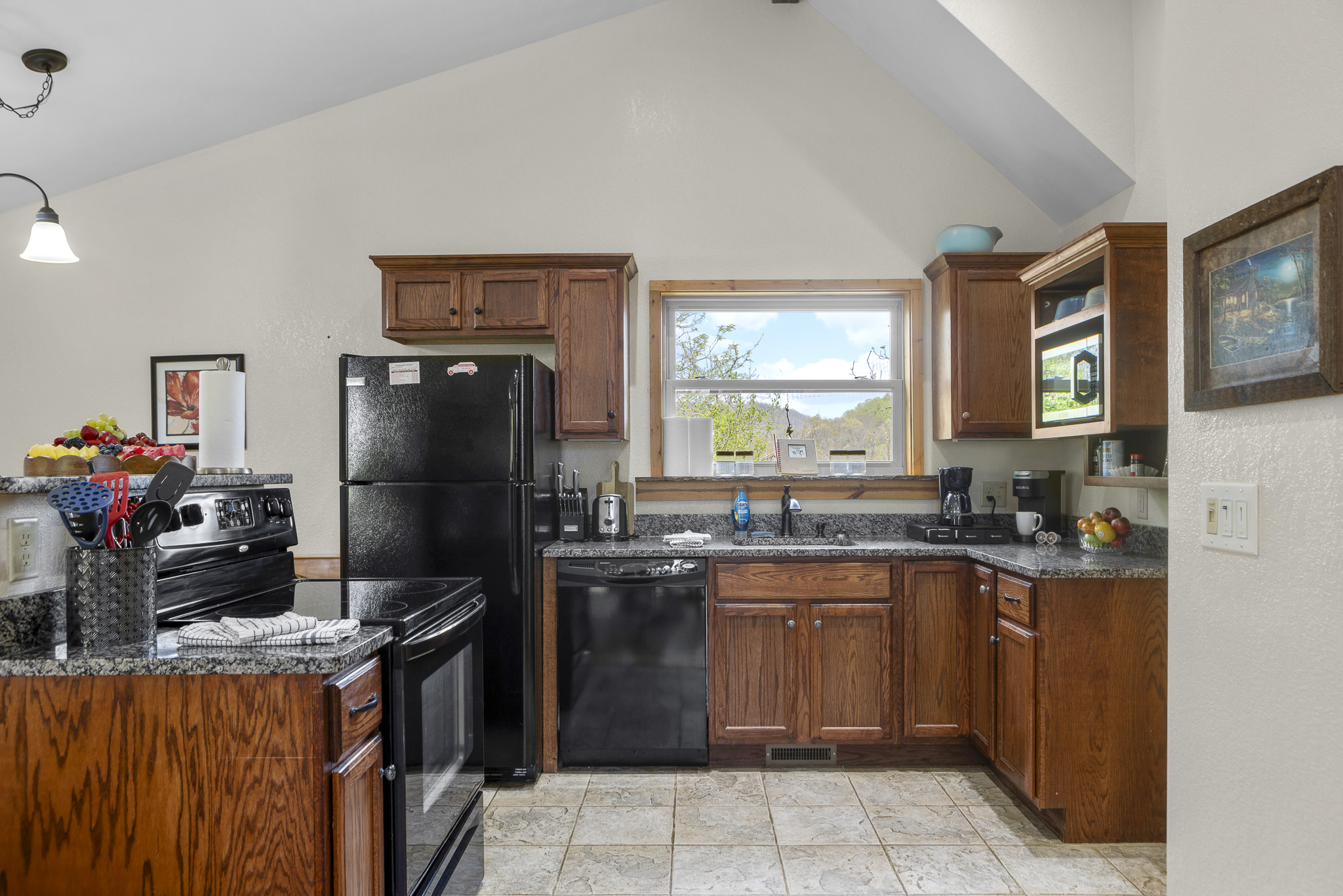 Kitchen: Whip up culinary delights with mountain views and modern appliances!