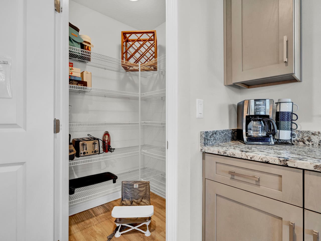 Well stocked kitchen includes blender, toaster, electric griddle, hand mixer and a portable child's chair. 