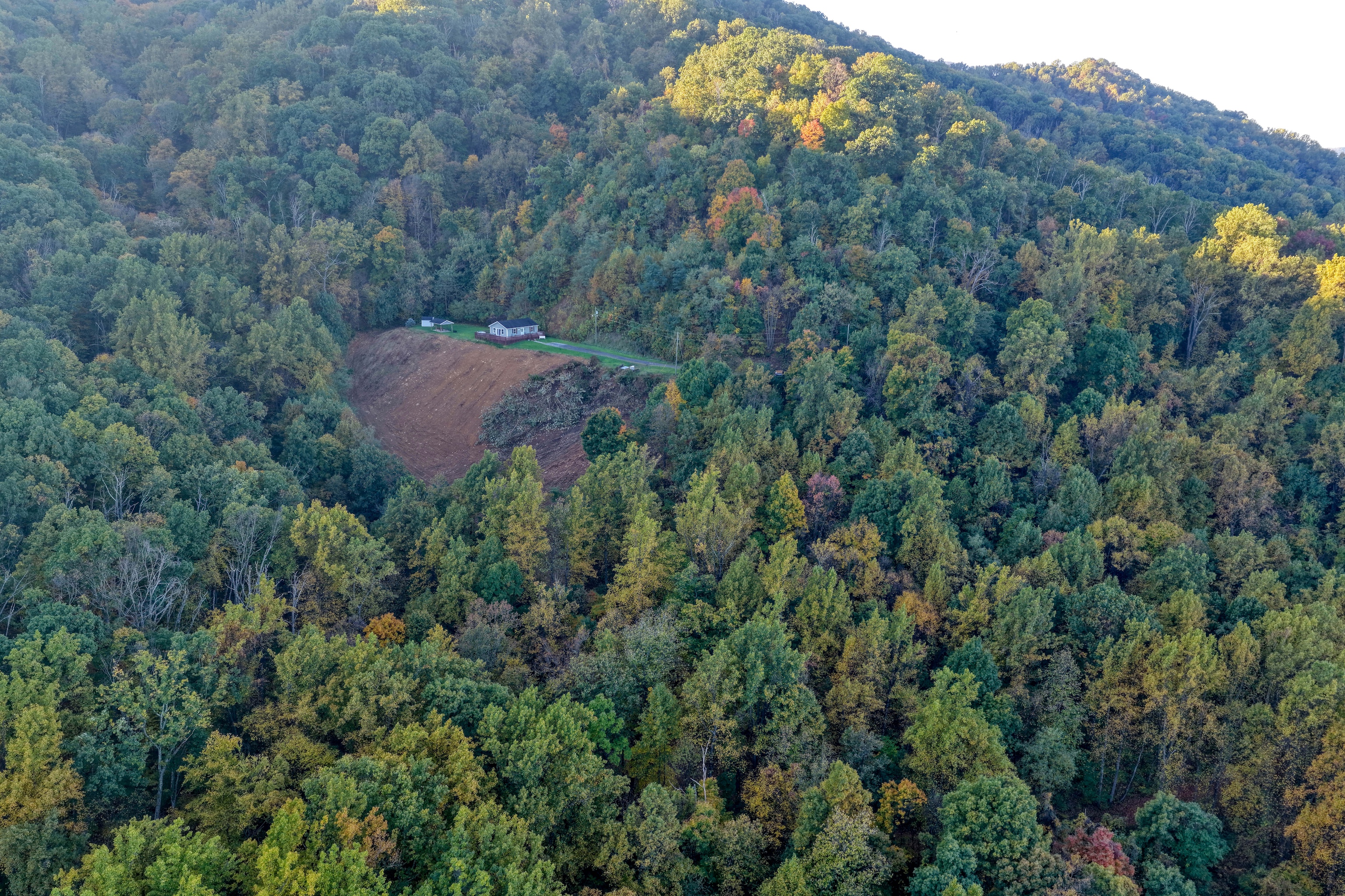 The property is 26 acres sitting at 1800 feet in elevation. No neighbors within sight and endless views. Total privacy, yet only a 15 minute drive into Stanley or Luray for whatever you need.