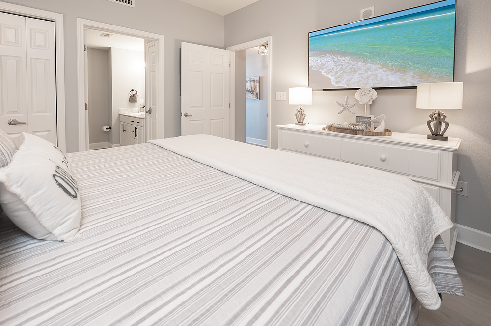 Relax after a beach day in your king master suite