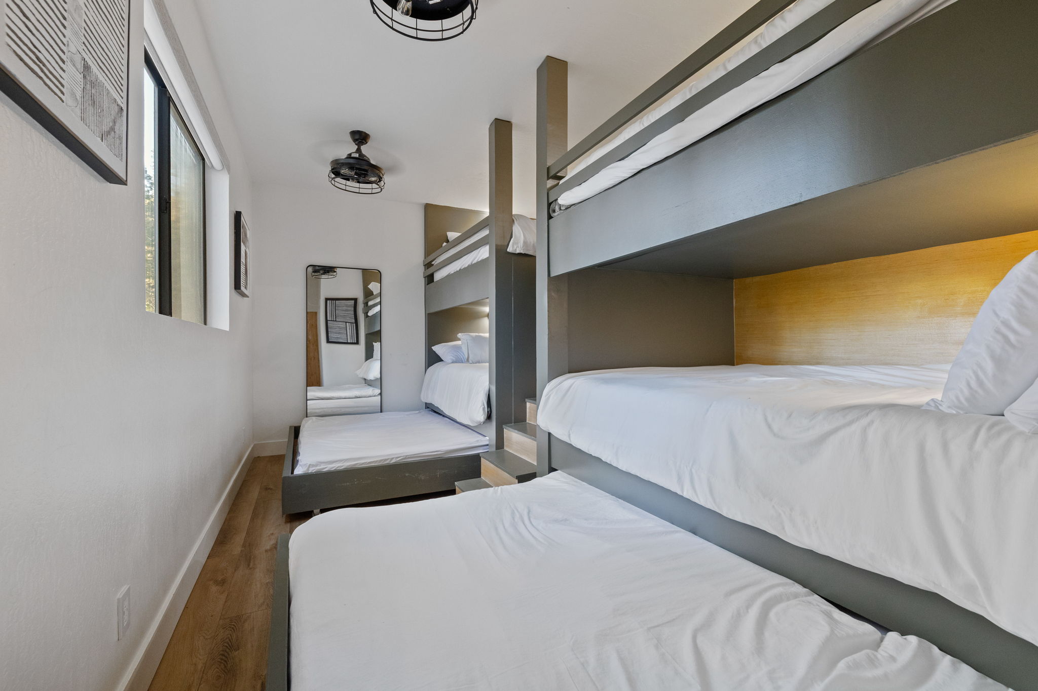 Built in bunks in bunk room downstairs. 4 queen beds and 2 full pull out beds. All memory foam matresses. All beds also have a light and USB plug.