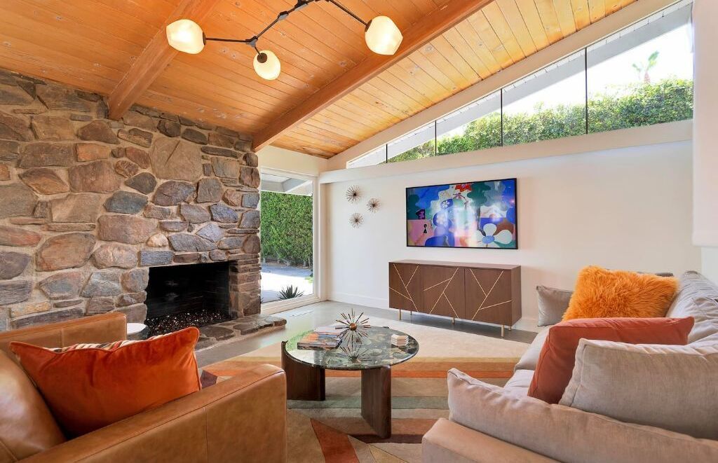 Great room with polished concrete floors and a gas fireplace