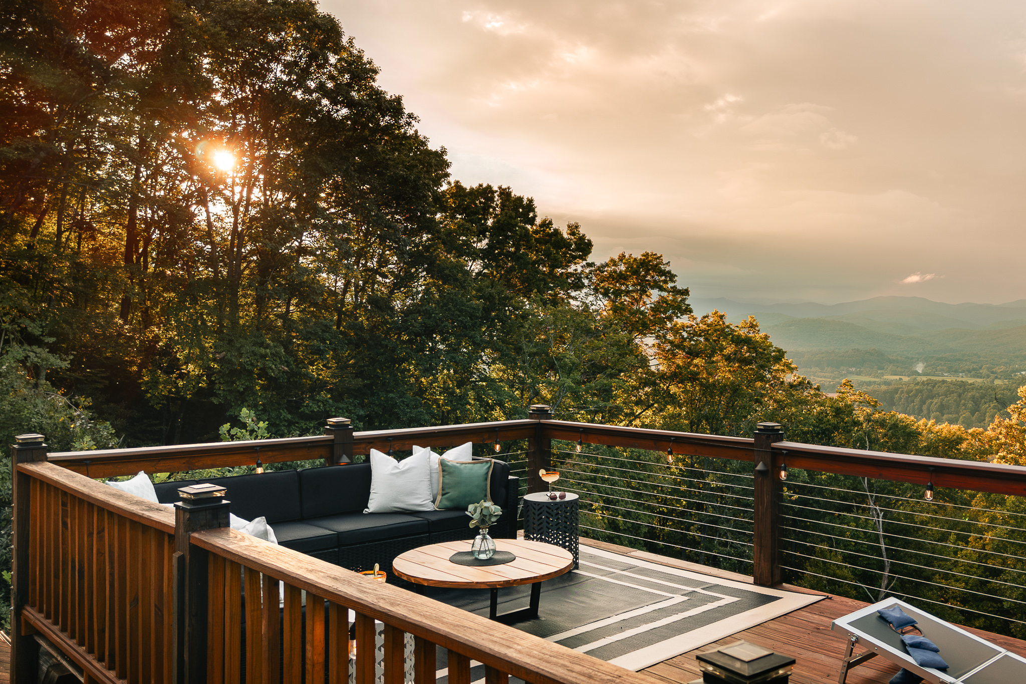 {Sunset Deck} Settle in with a drink and watch the sun disappear behind layers of the Blue Ridge Mountains from your own private mountain retreat.