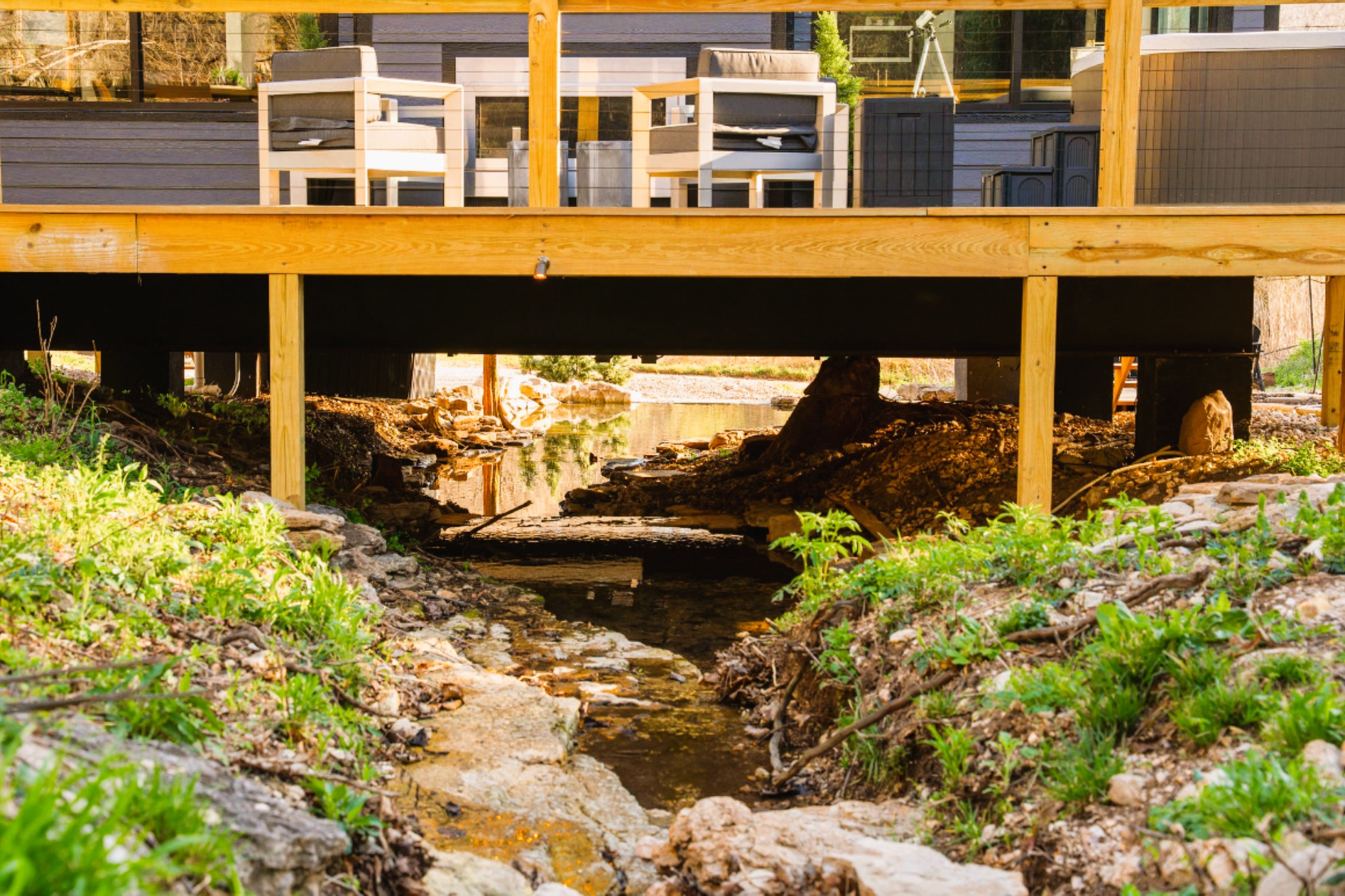 Built directly above the creek—see & hear the water flowing beneath you