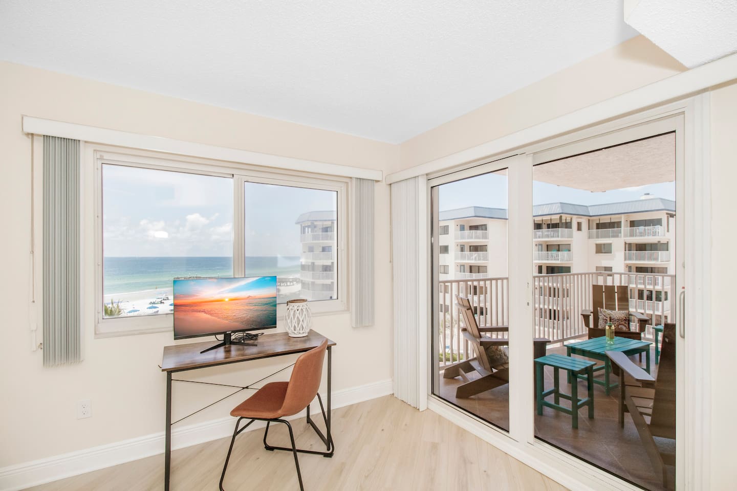 King size master bedroom with pool/gulf views and patio access. 