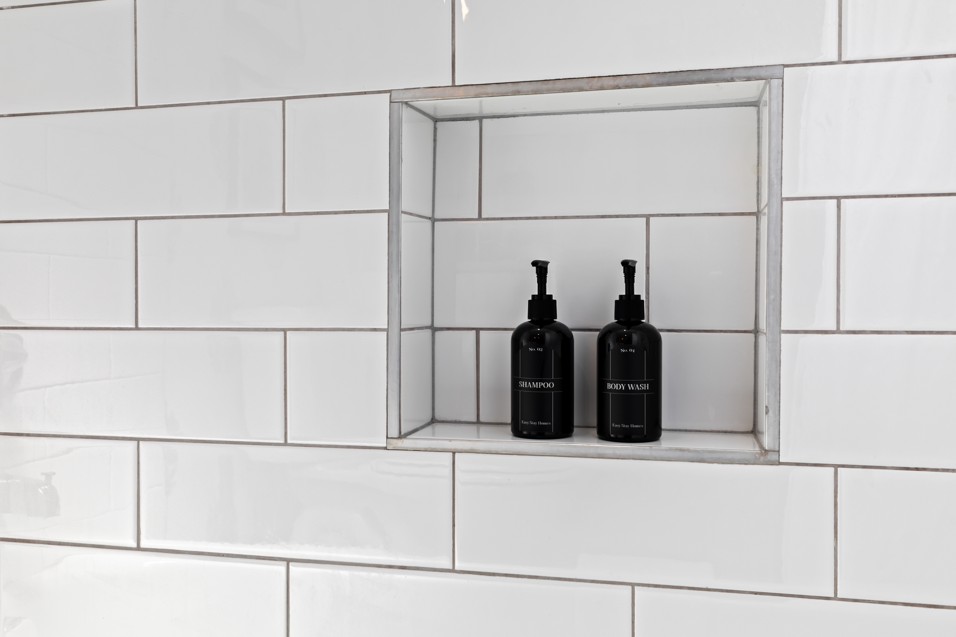Elegant built-in shelf with premium toiletries for your convenience.
