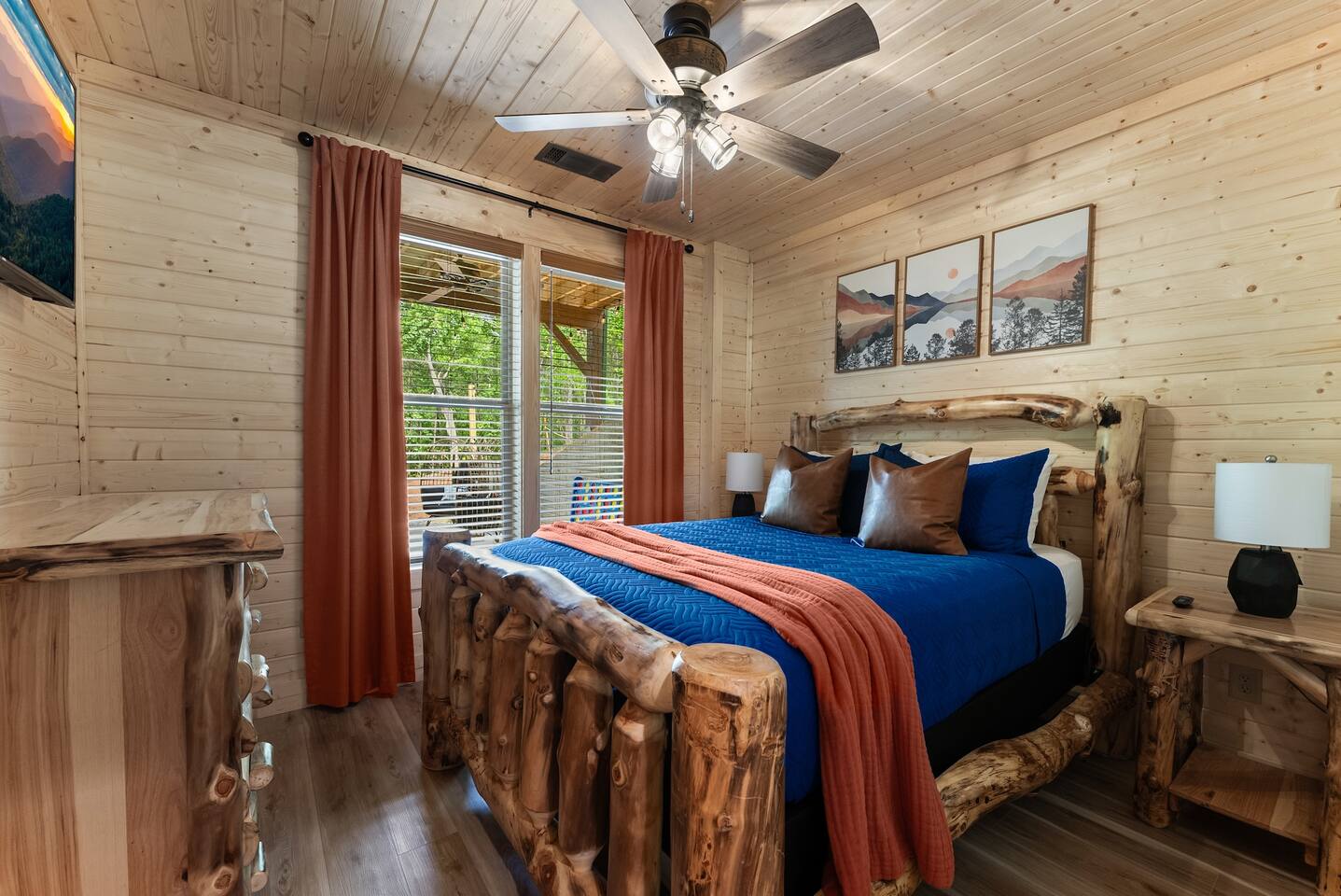 Charming queen bedroom with cozy decor and easy access to a nearby shared bathroom