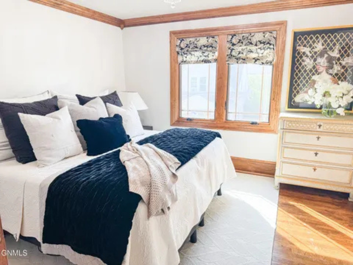 A simple, peaceful room where you can settle in and feel right at home.