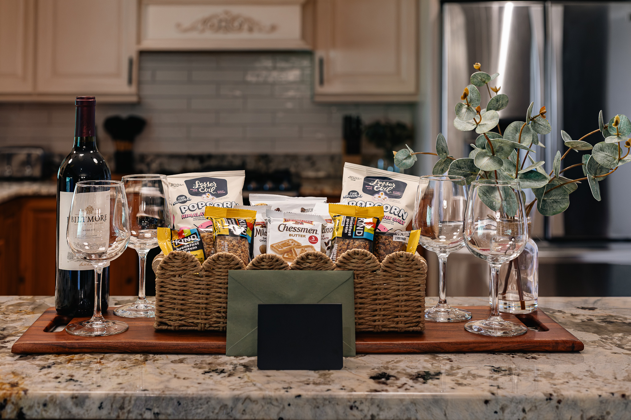 {Welcome Gift} Our first guests are welcomed with a curated basket of treats and a bottle of local Biltmore Estate wine—our way of starting your stay on a delicious note. 🍷🌲
