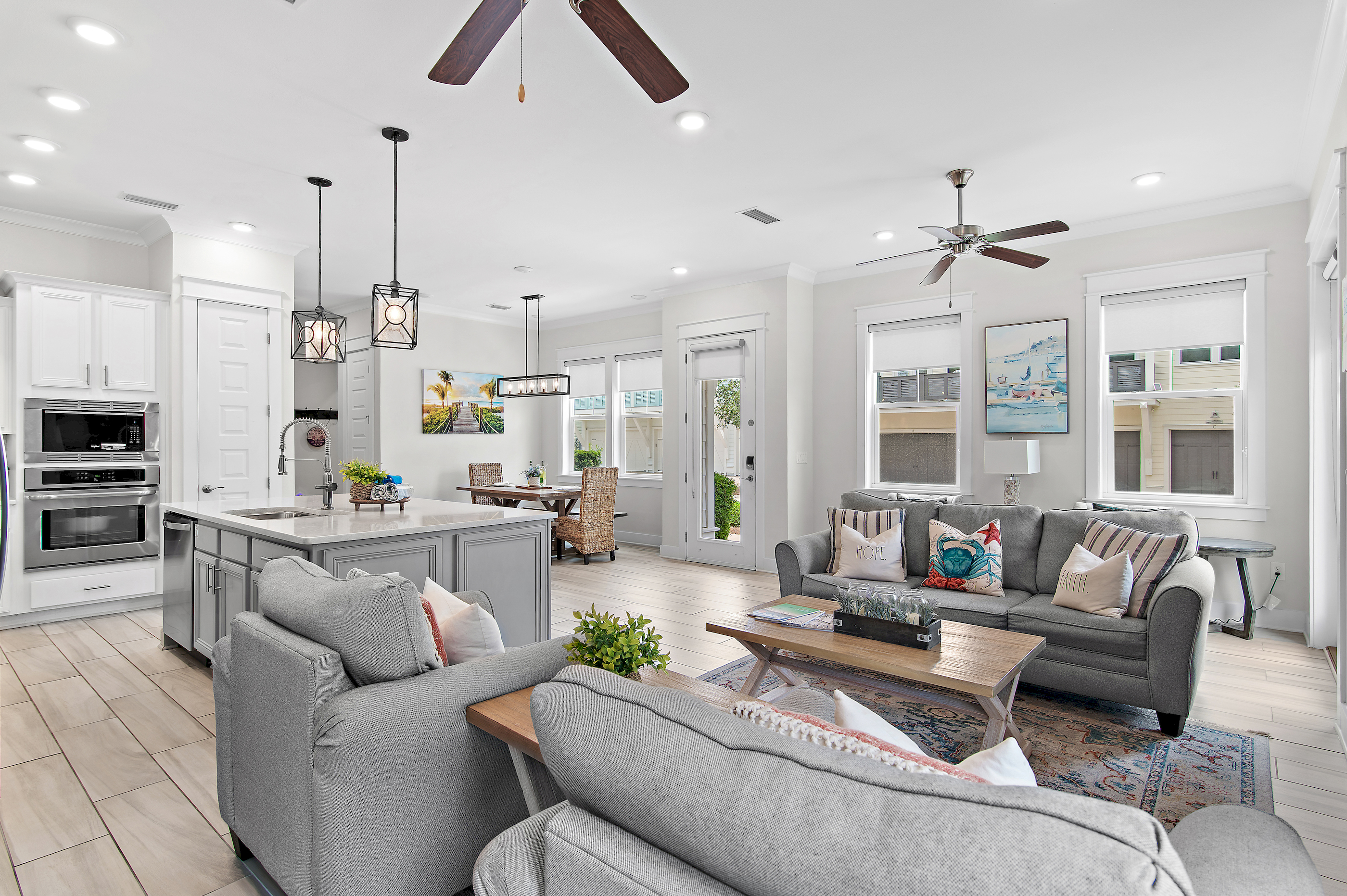 Open-concept living room, kitchen, and dining area, perfectly designed for entertaining and spending time together.