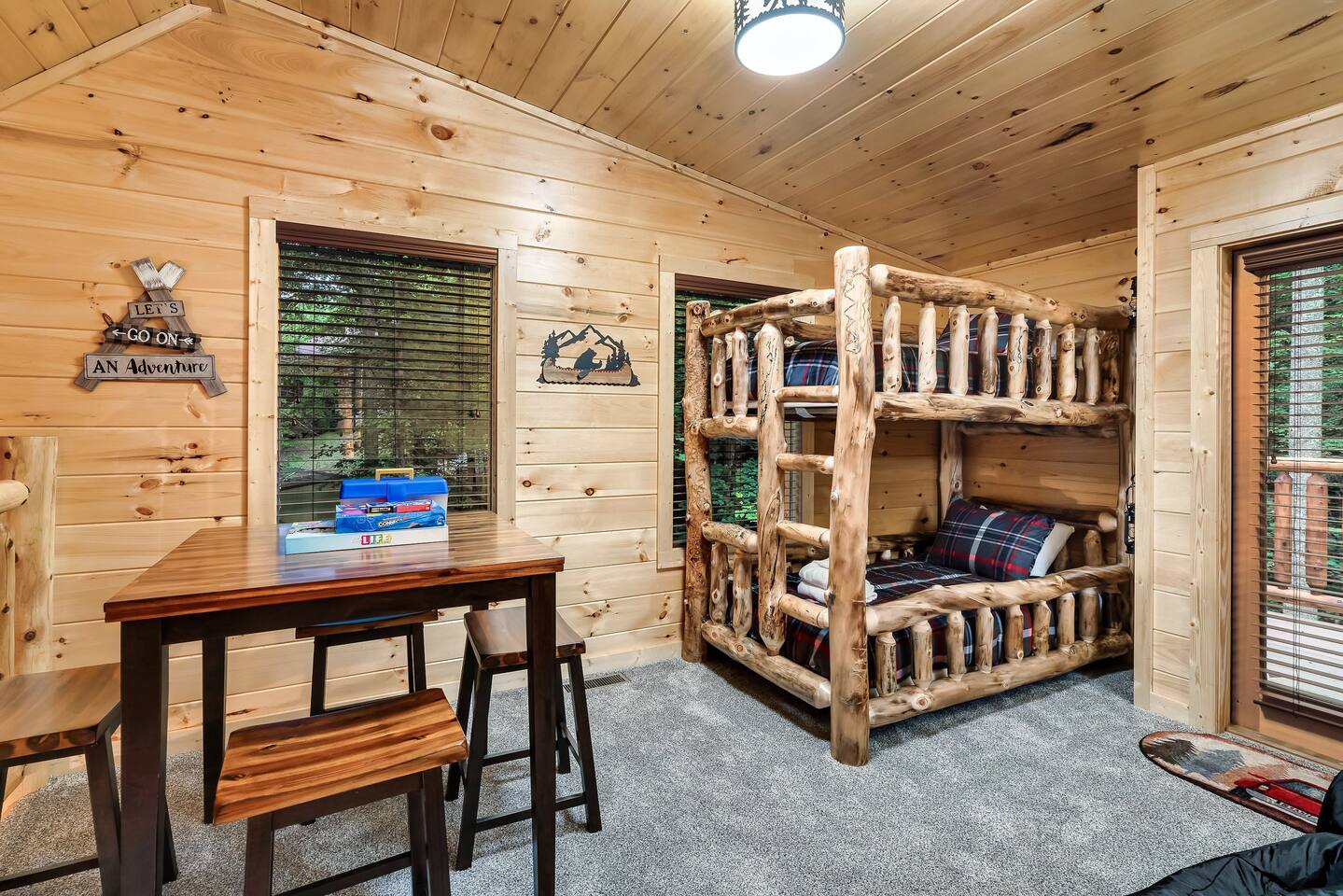 Bedroom #3 in in the loft area with twin bunks plus arcades and games