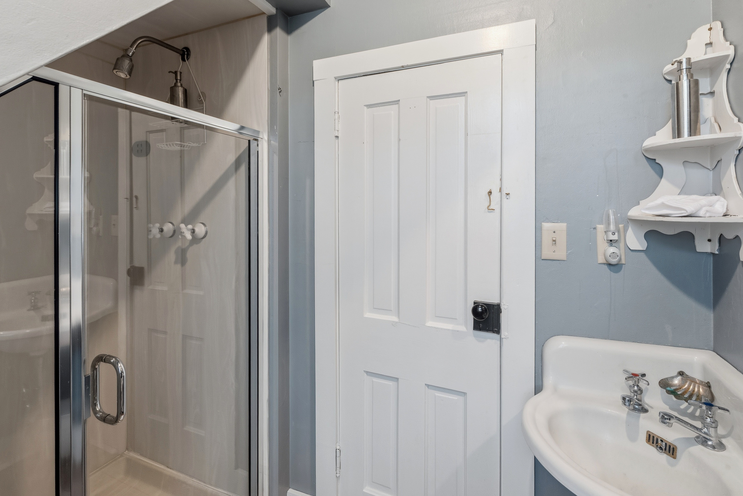 Upstairs bathroom with walk-in shower. 