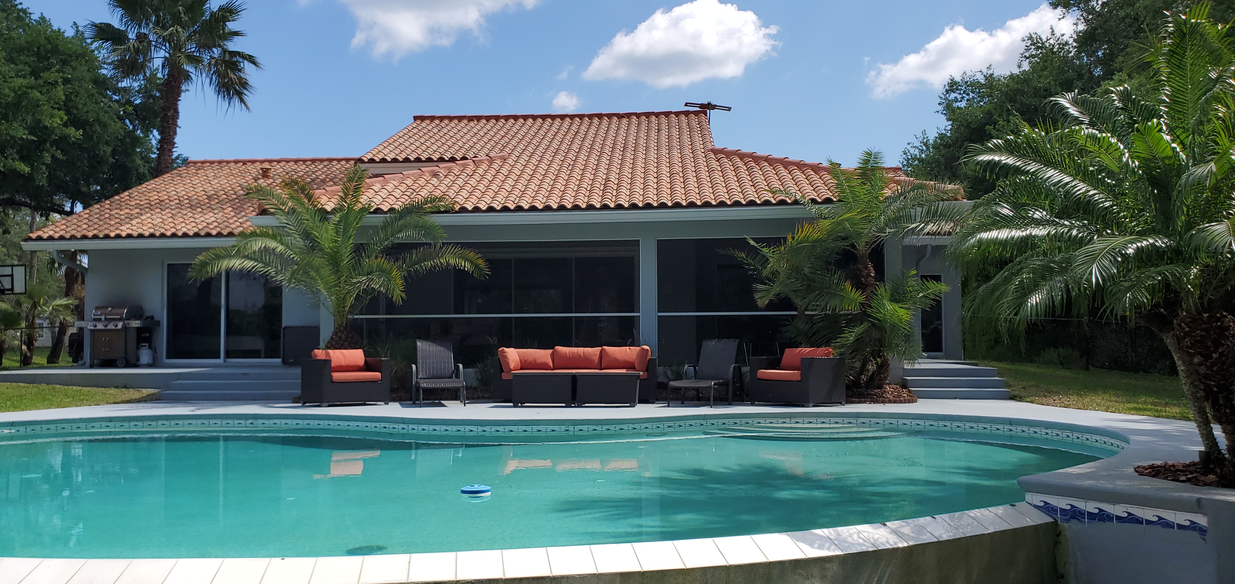 Sunset Cove infinity edge pool and view from backyard