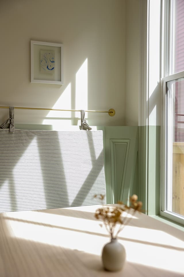 The breakfast nook may be our favorite part of the house. Featuring custom cushions and the oversized rice paper lantern from Hay. It's a great place to share a coffee or take a meeting.